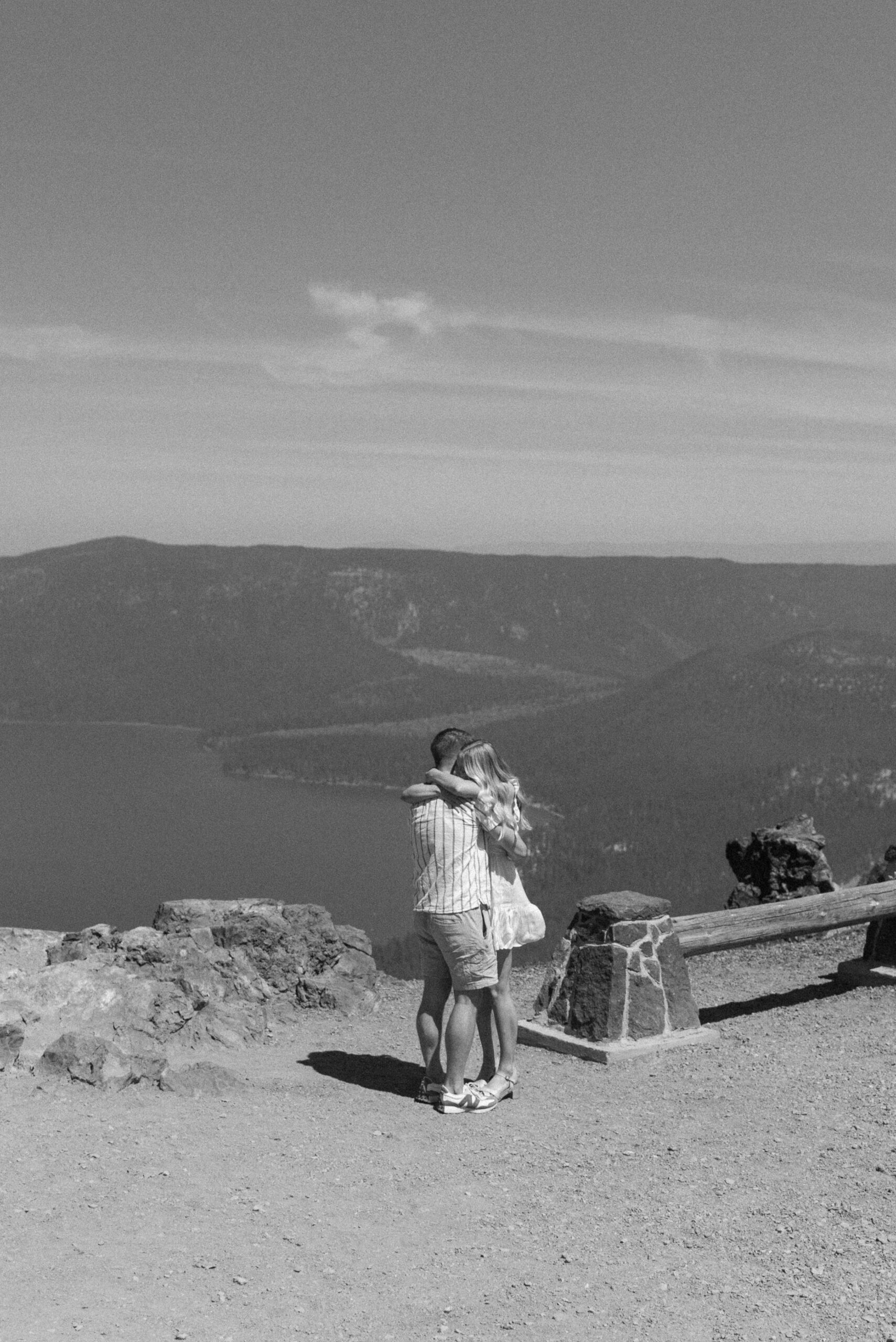 black and white of couple hugging at oregon proposal