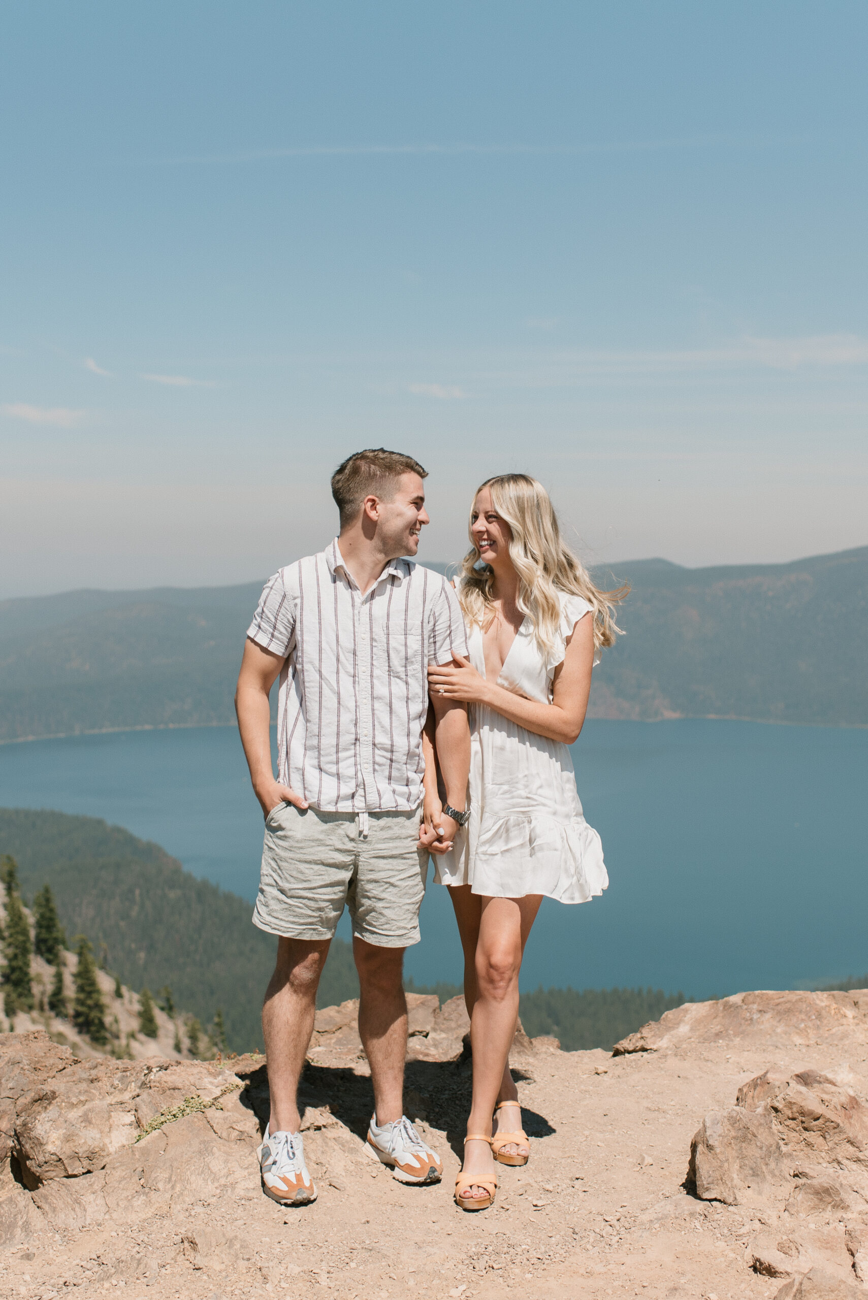 couple laughing with views in the background