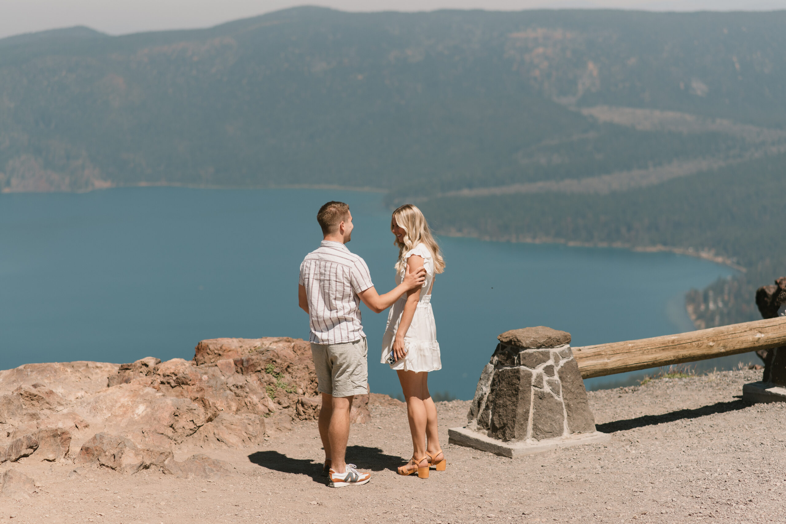 the couple at paulina peak taking in the views