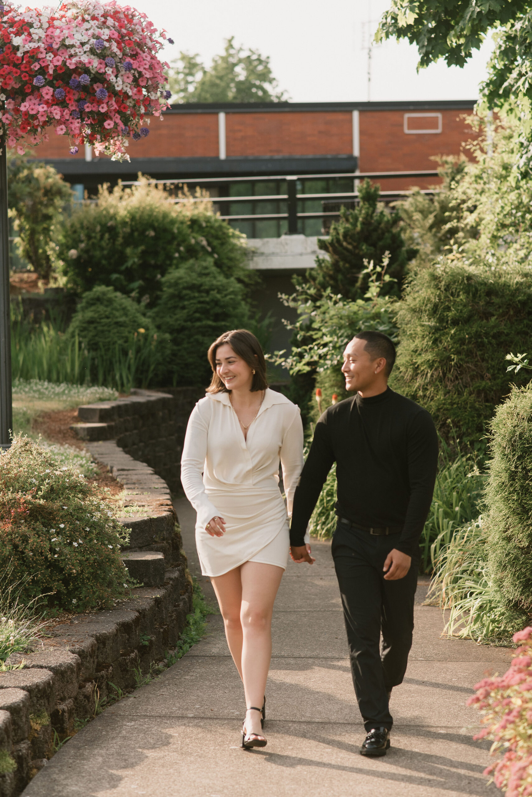 couple walking hand in hand at editorial couple photoshoot 