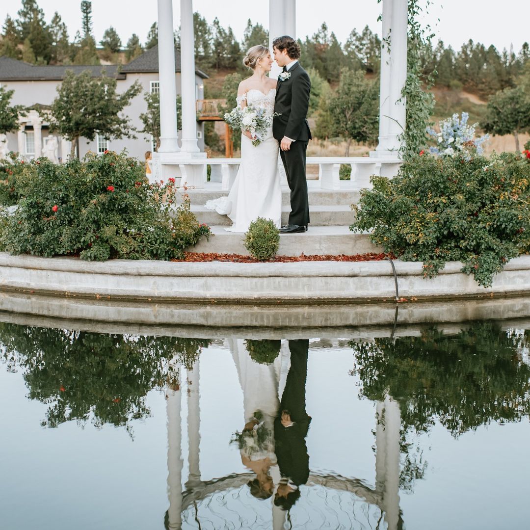 bridal portraits by the water at european-inspired wedding venue 