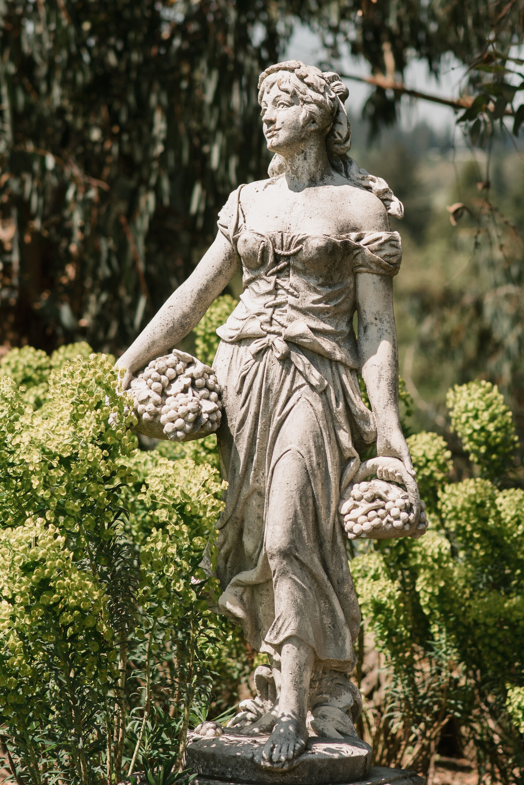 garden statues at european-inspired wedding venue 