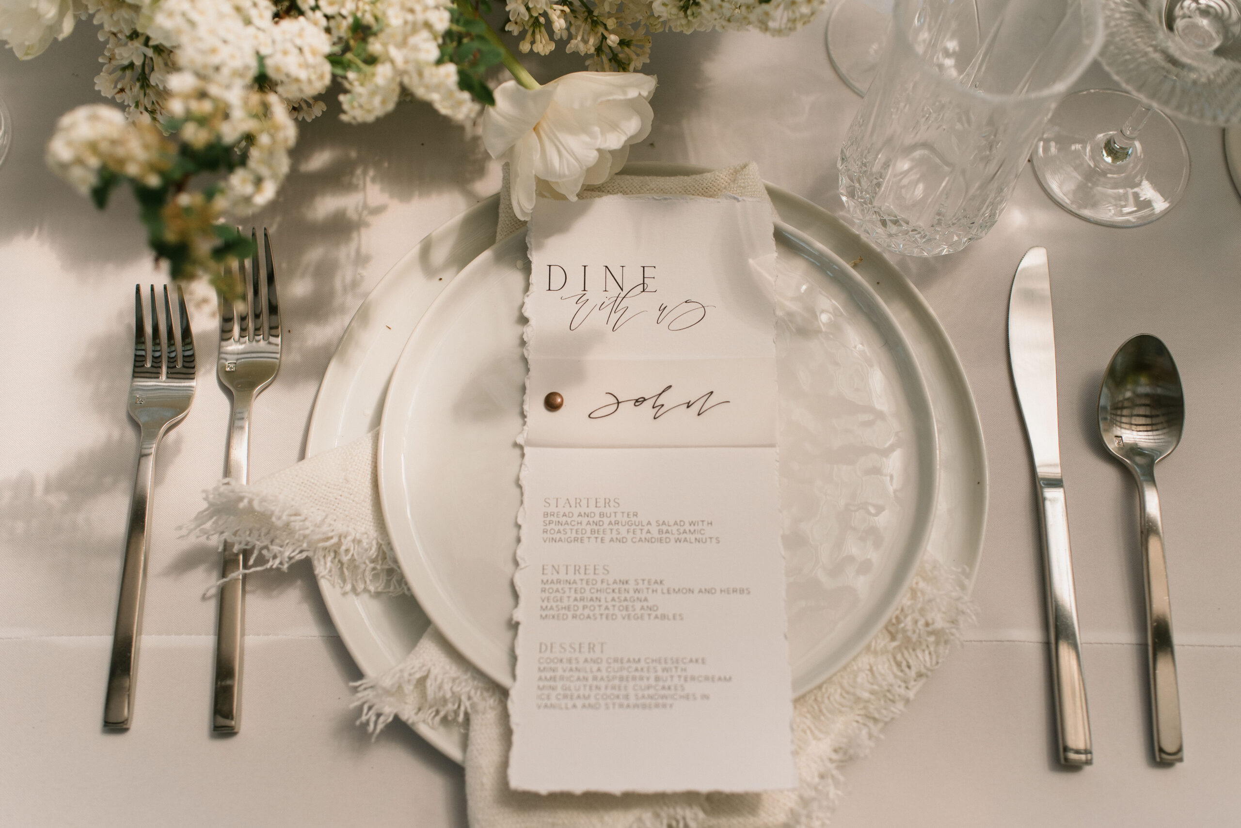 paper menu details from european-inspired wedding venue photos