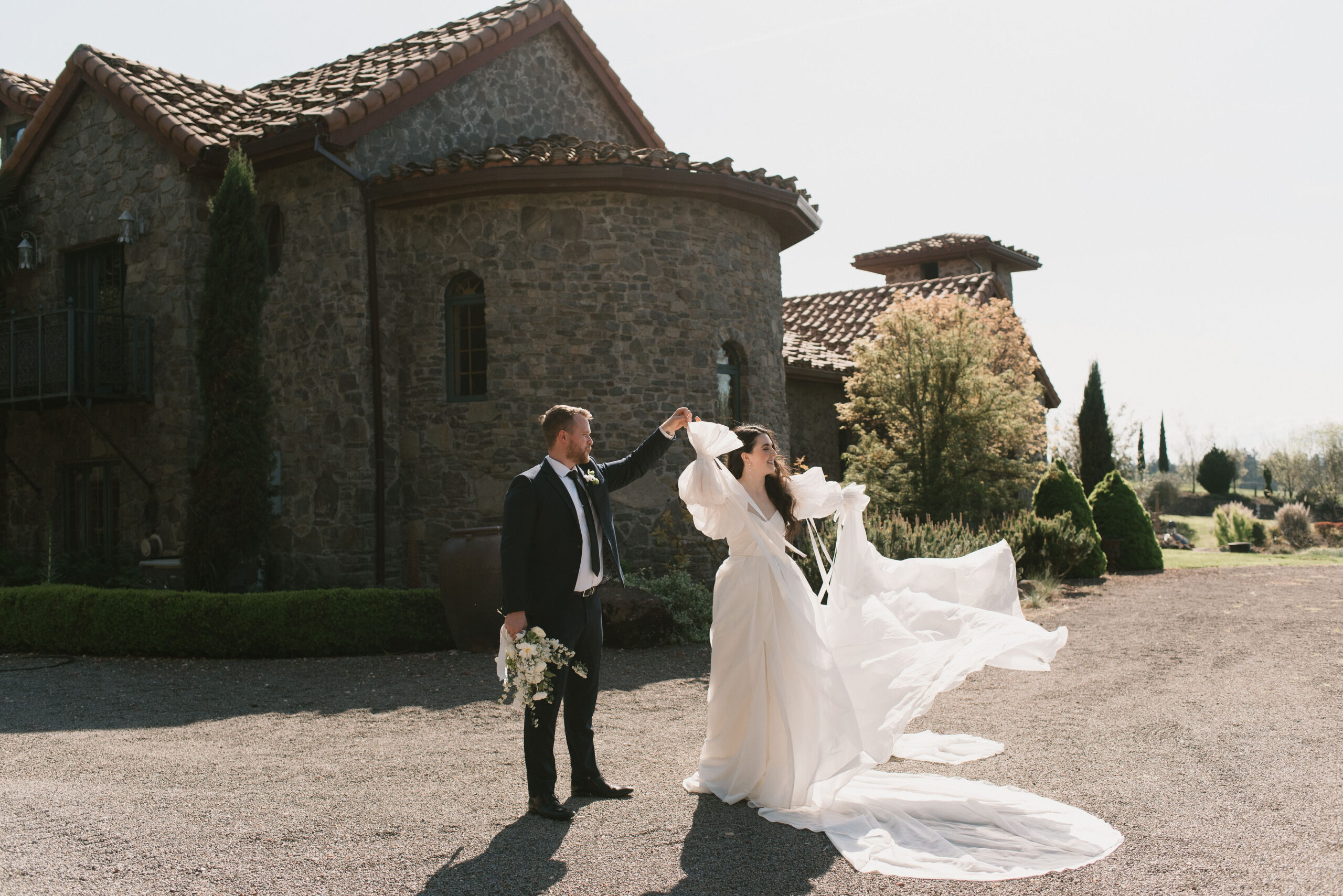 bride and groom dancing at european-inspired wedding venue 