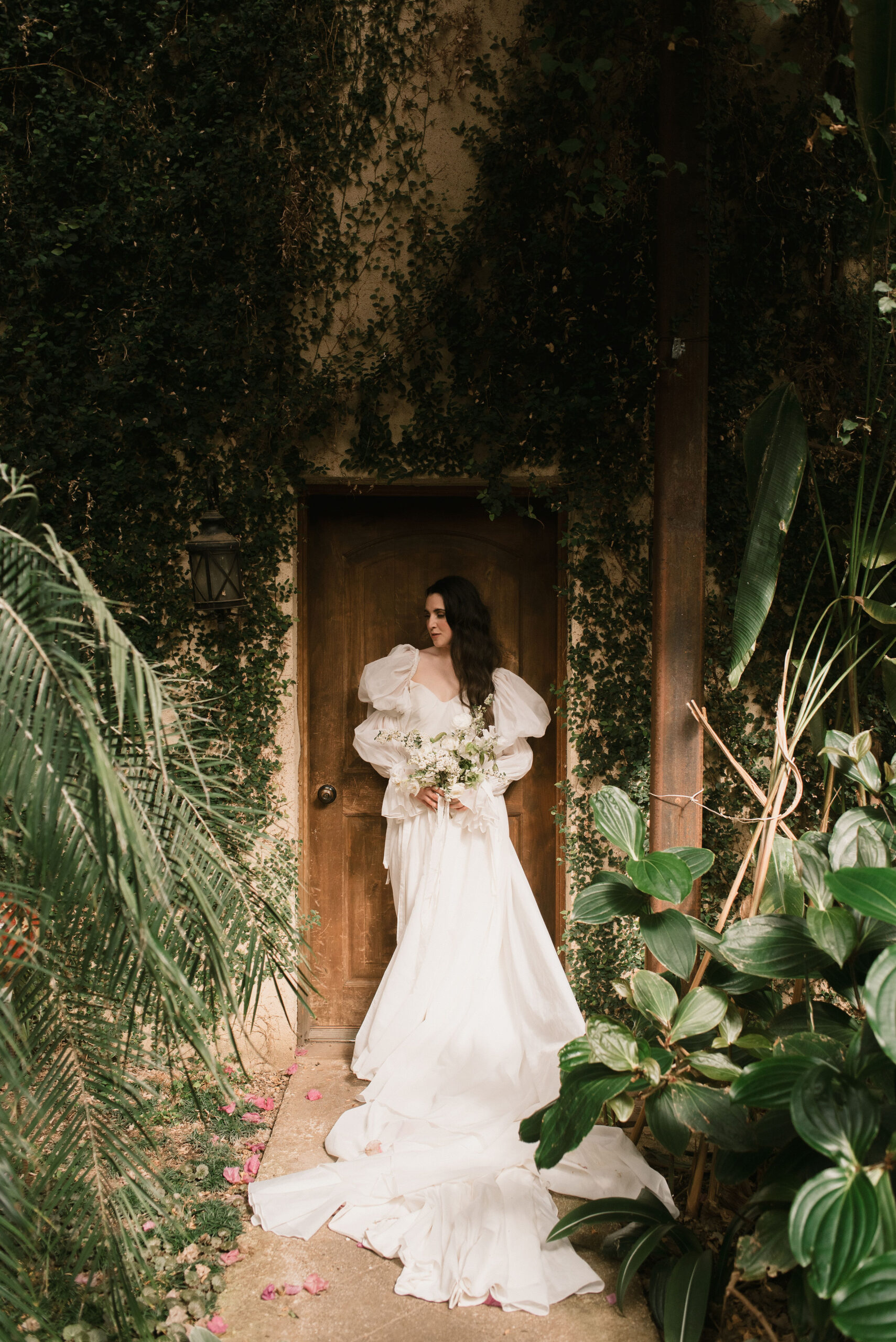 bride greenery portrait at european-inspired wedding venue 