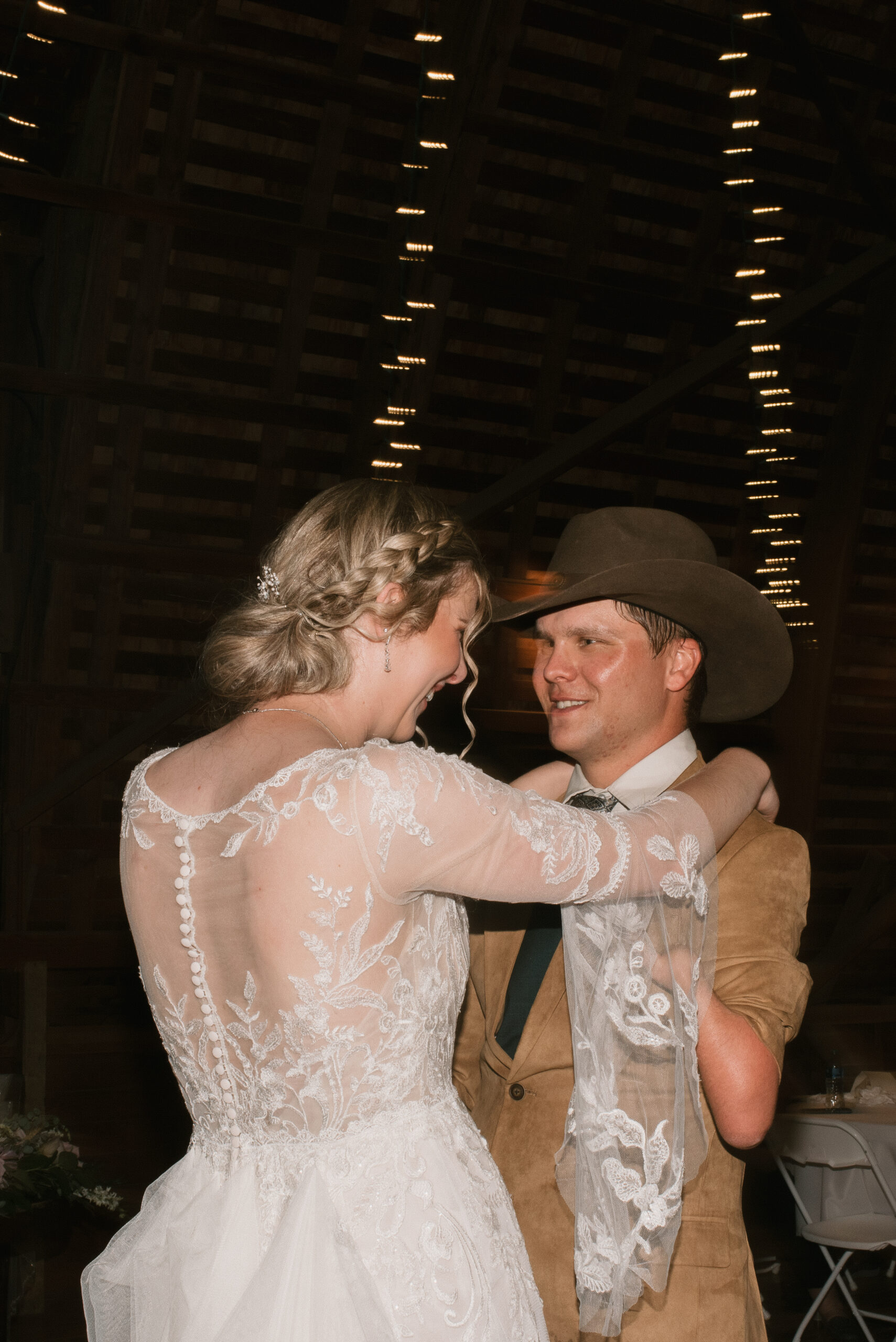 candid wedding photography of bride and groom first dance