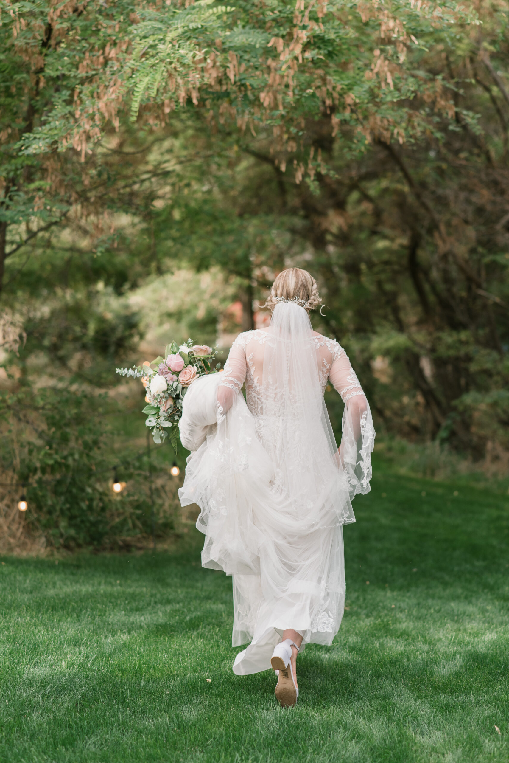 candid wedding photography of bride walking away
