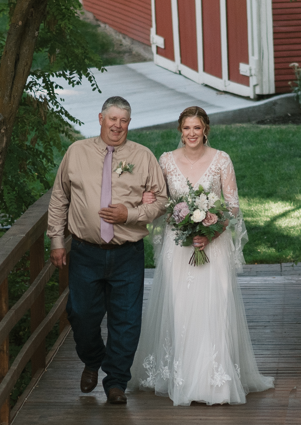 candid wedding photography of bride and dad walking down the aisle 