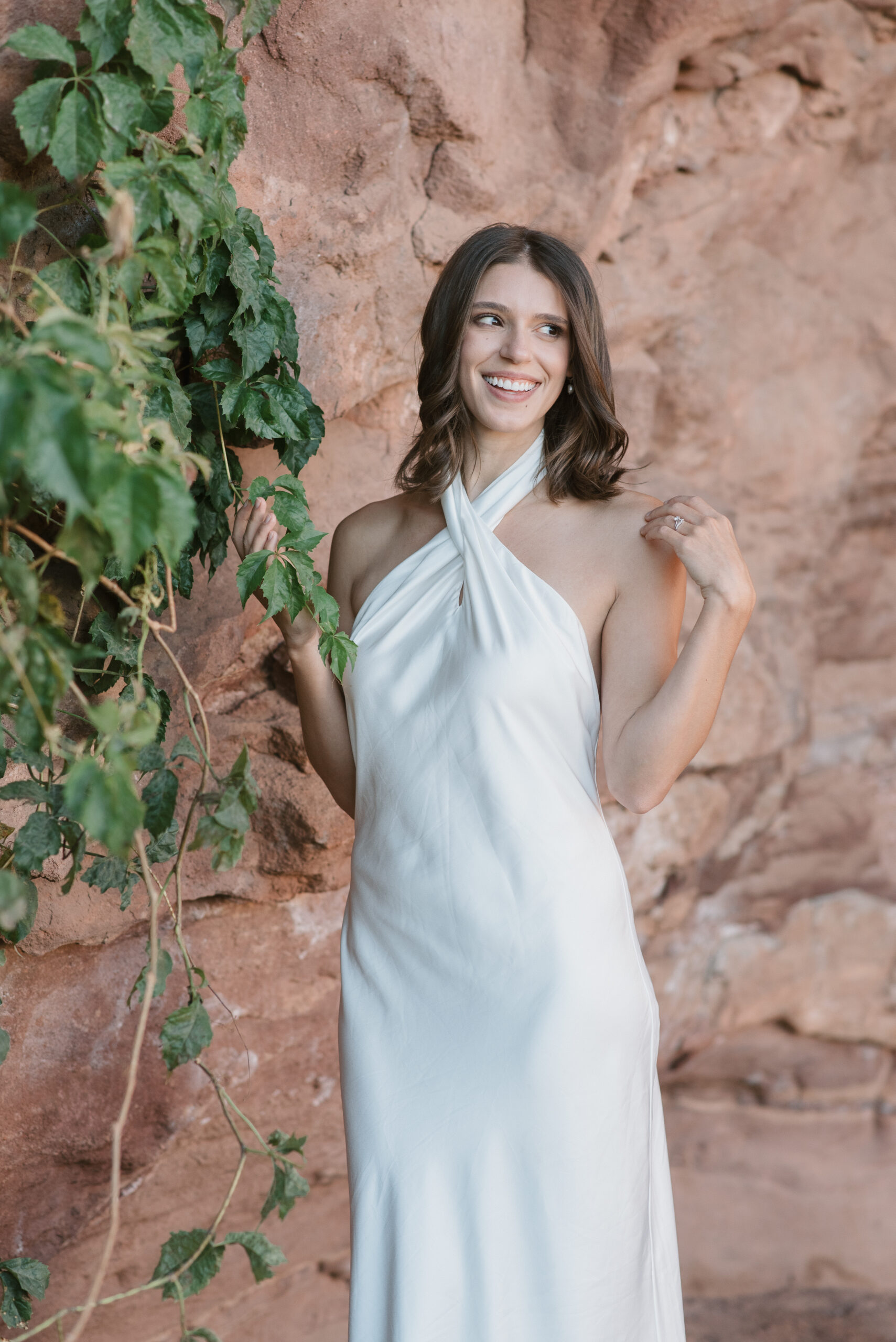bridal portrait by red rocks and vines at colorado elopement 