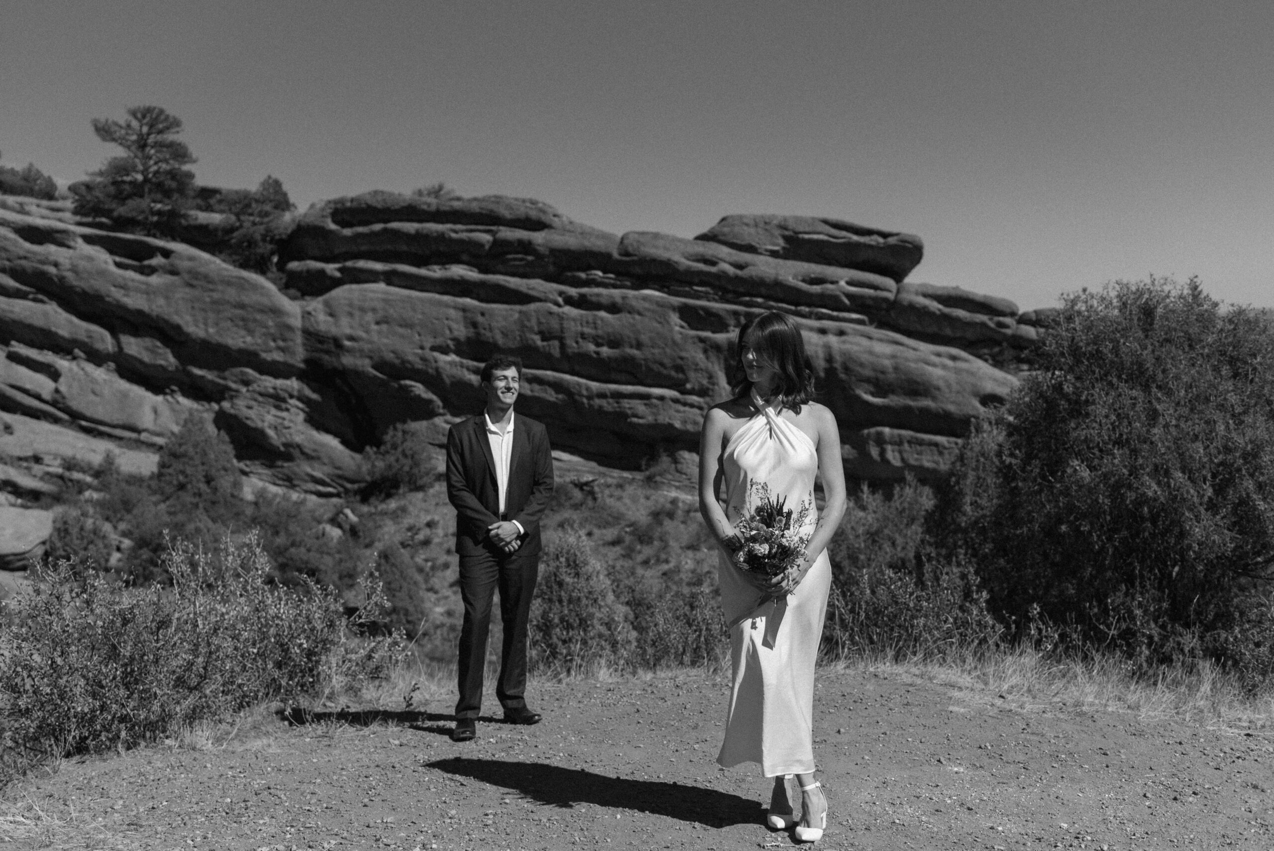 groom standing behind bride at colroado elopement 