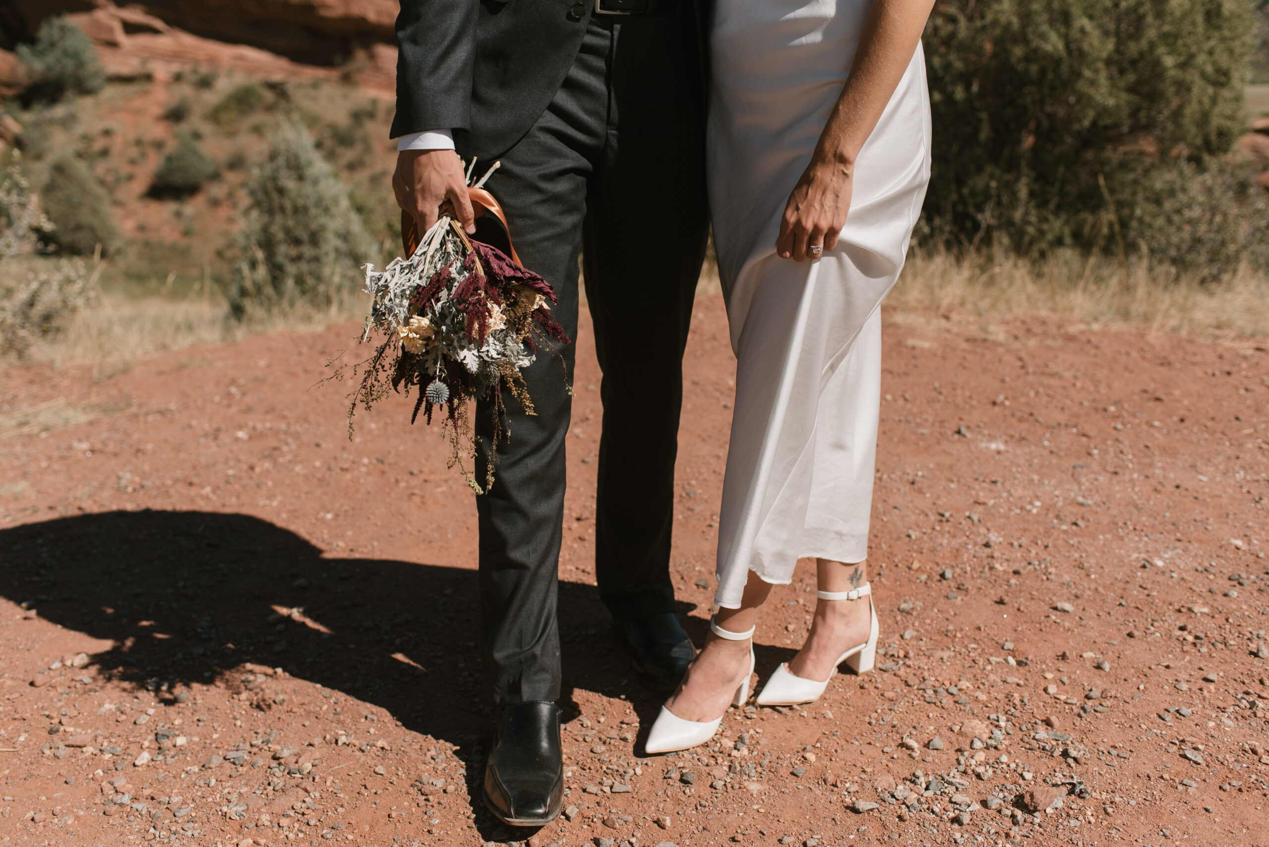 bridal couple shoes and bouquet