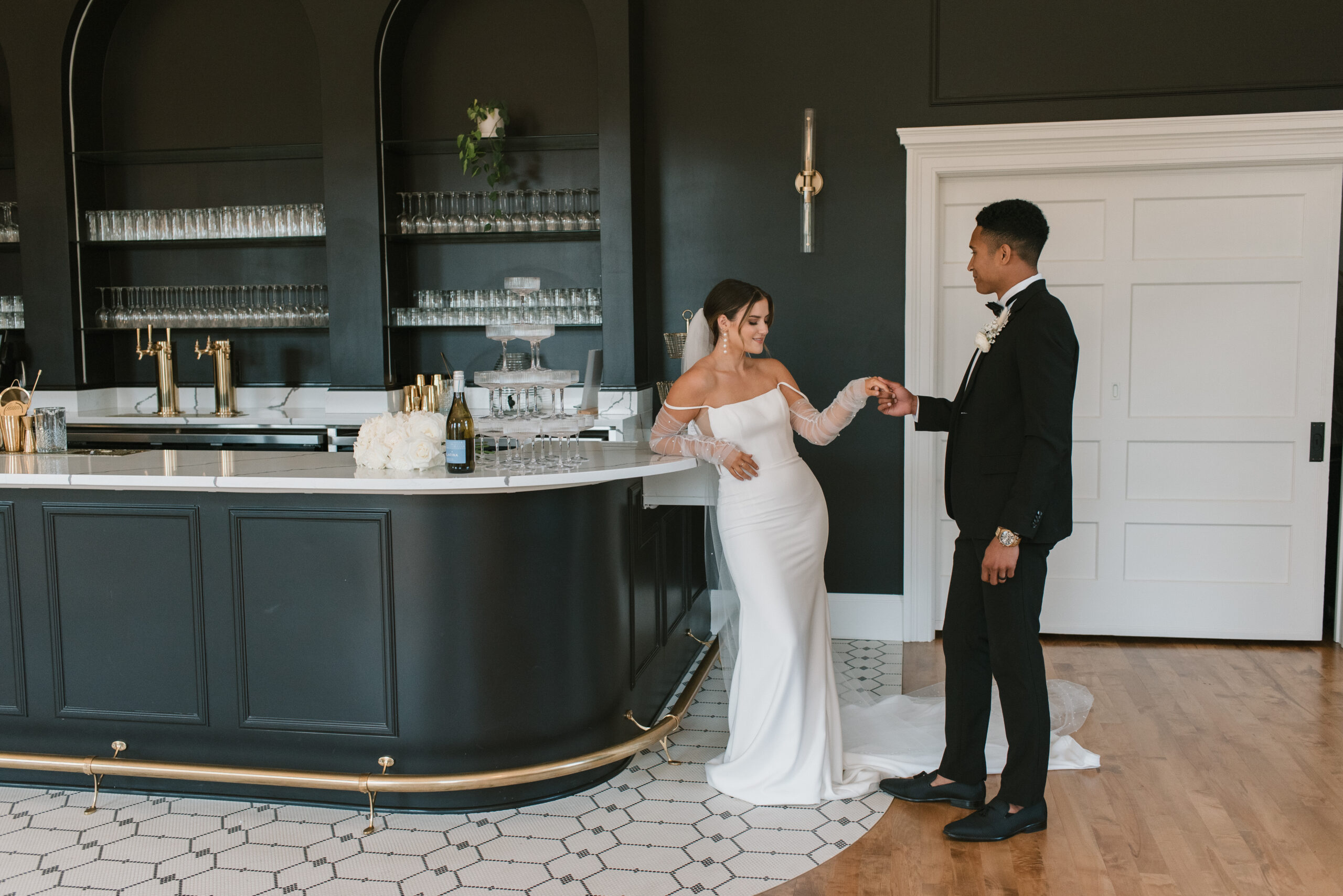 bride and groom at luxury wedding reception bar 