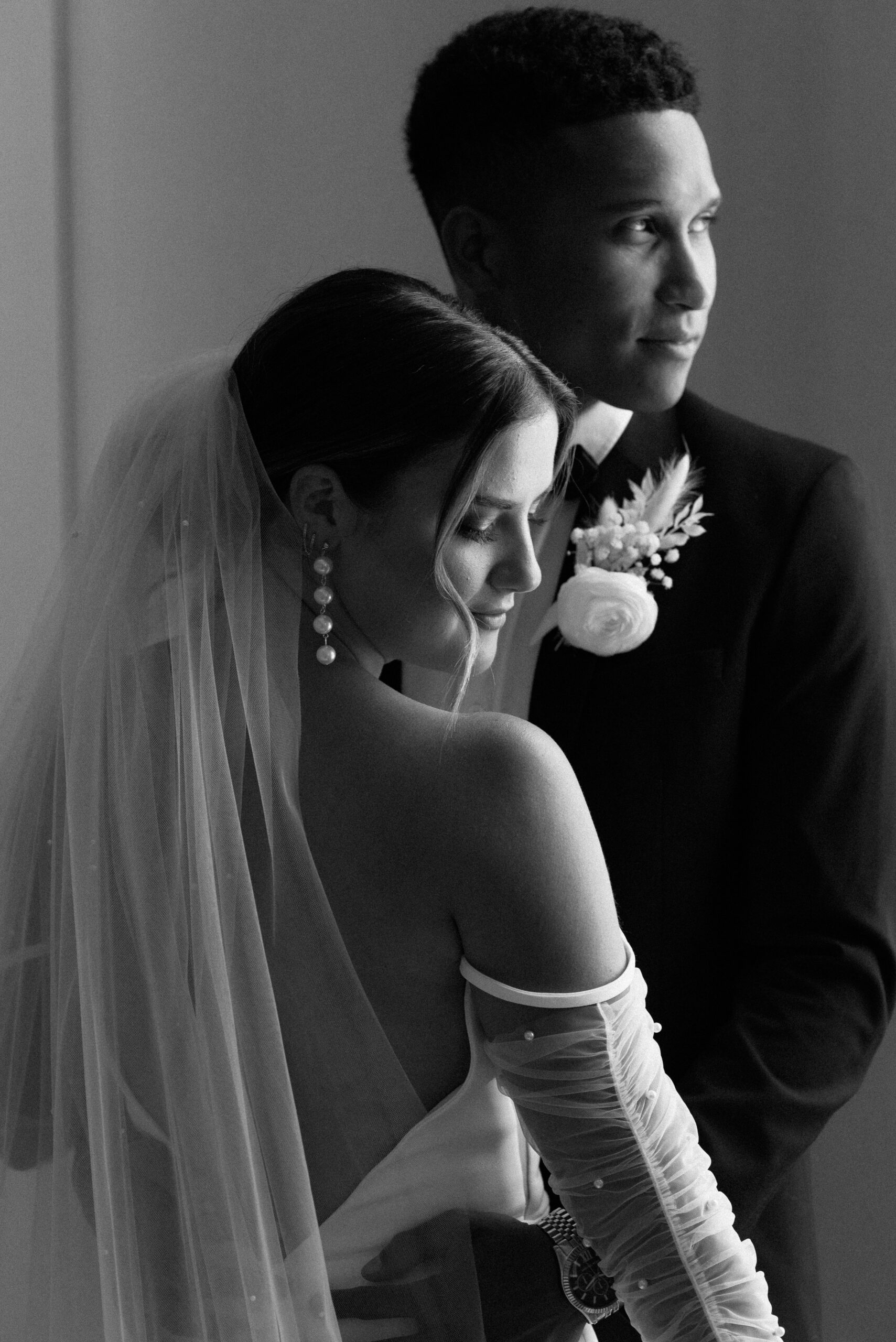 black and white editorial bride and groom portrait 
