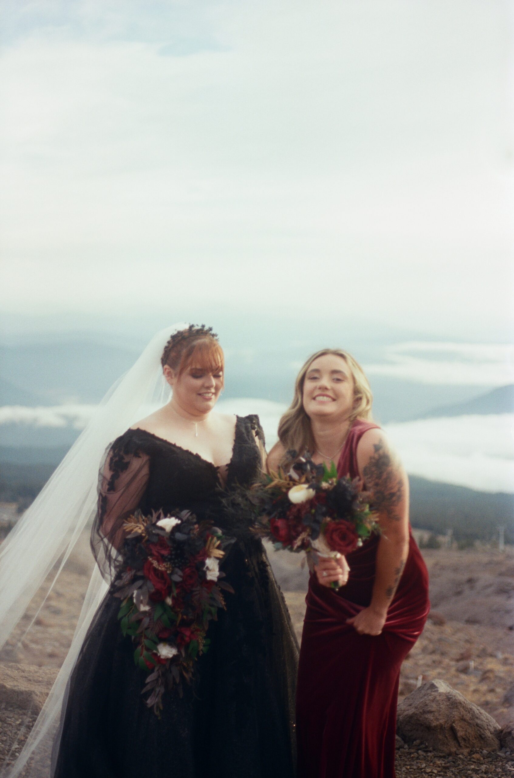candid wedding film photography of the bride and a bridesmaid