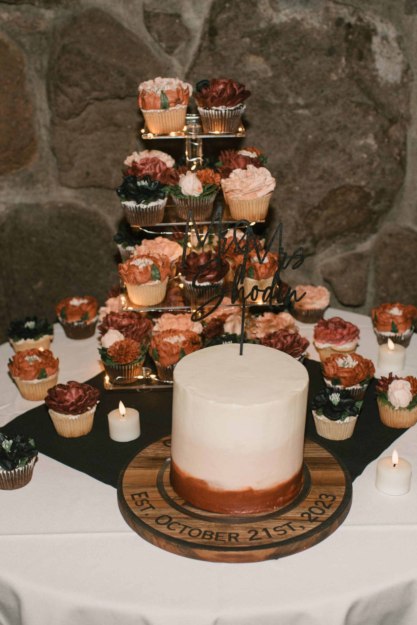 wedding cake and cupcakes 