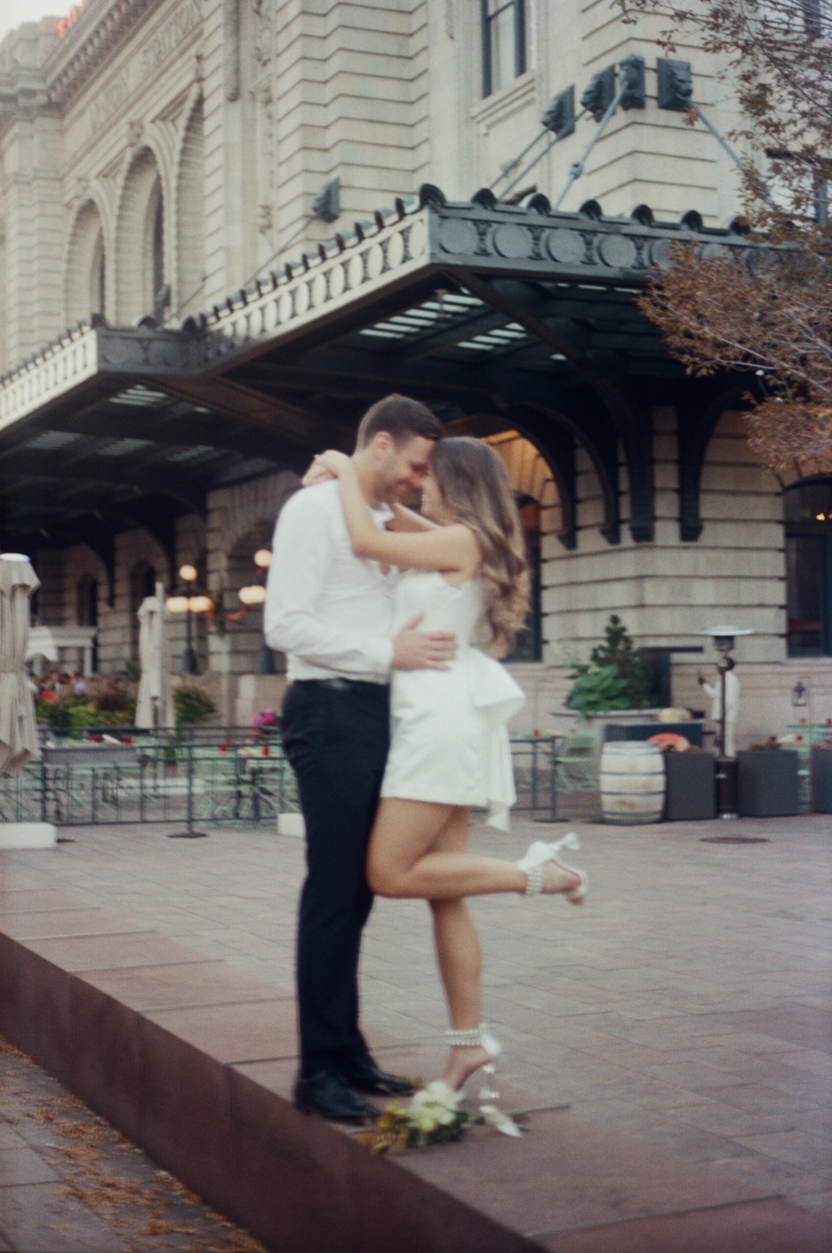 wedding film photography of a couple holding each other downtown denver 