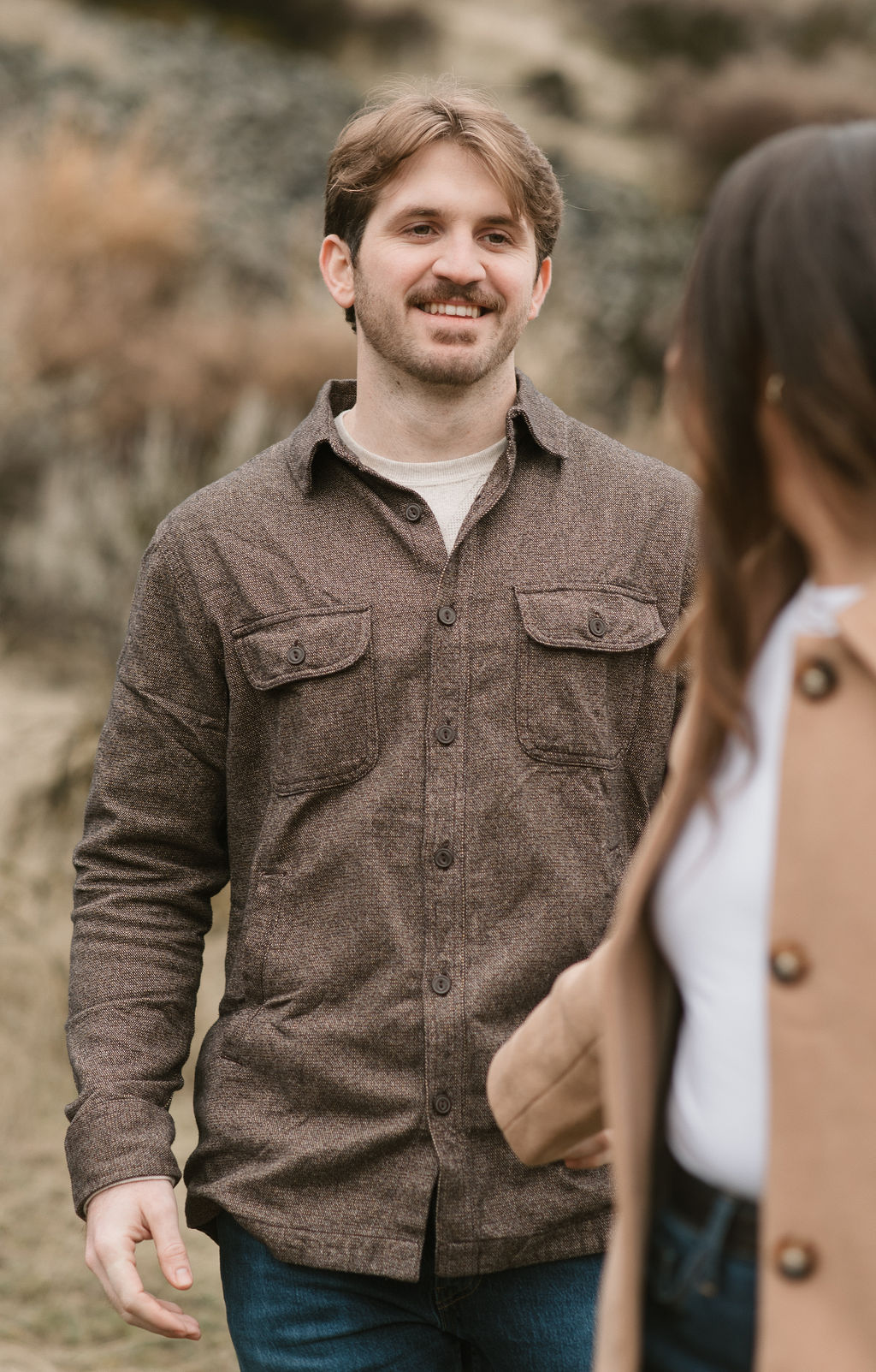 fiance looking at other fiance during their modern engagement pictures