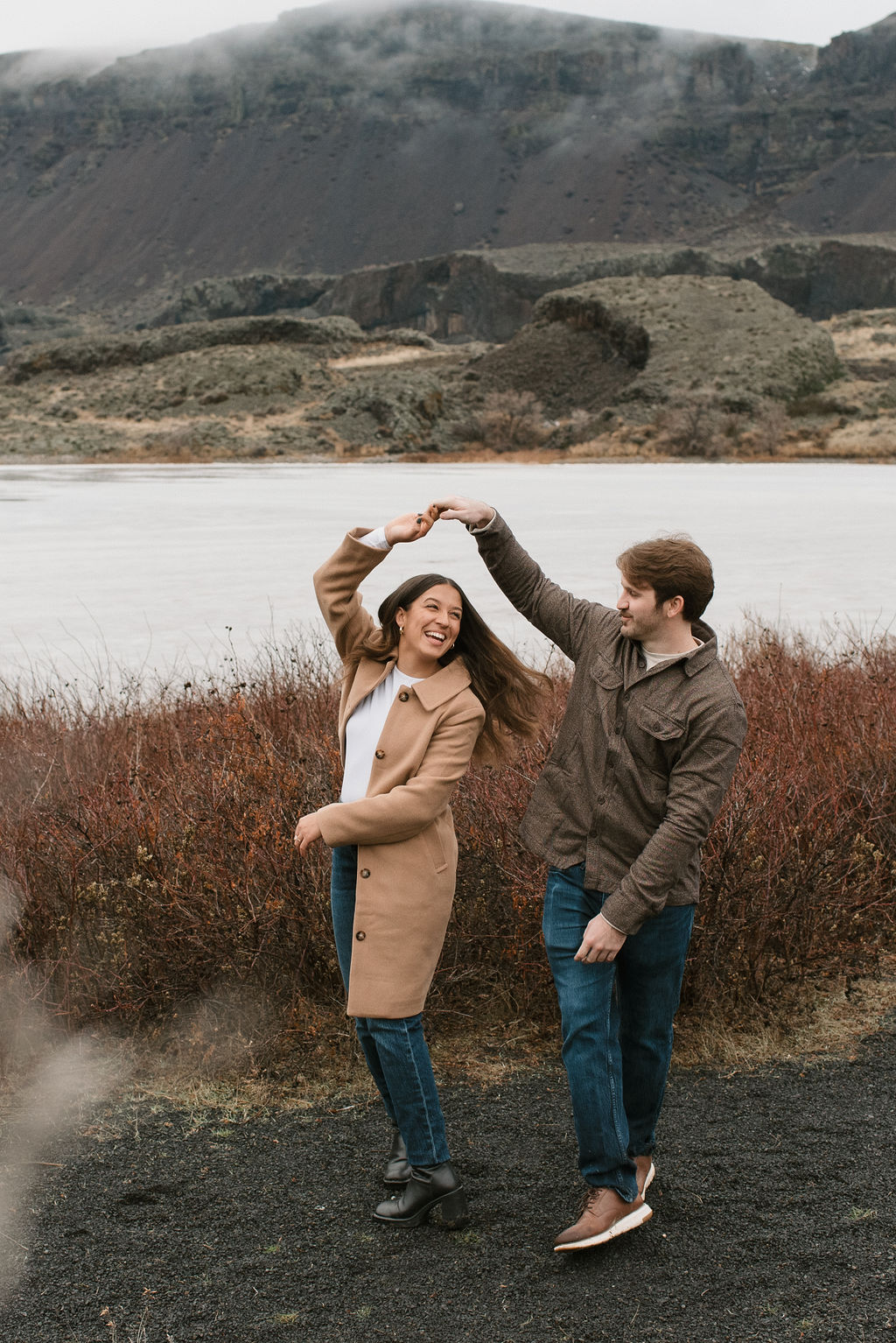 couple dancing together outside during their washington engagement photos