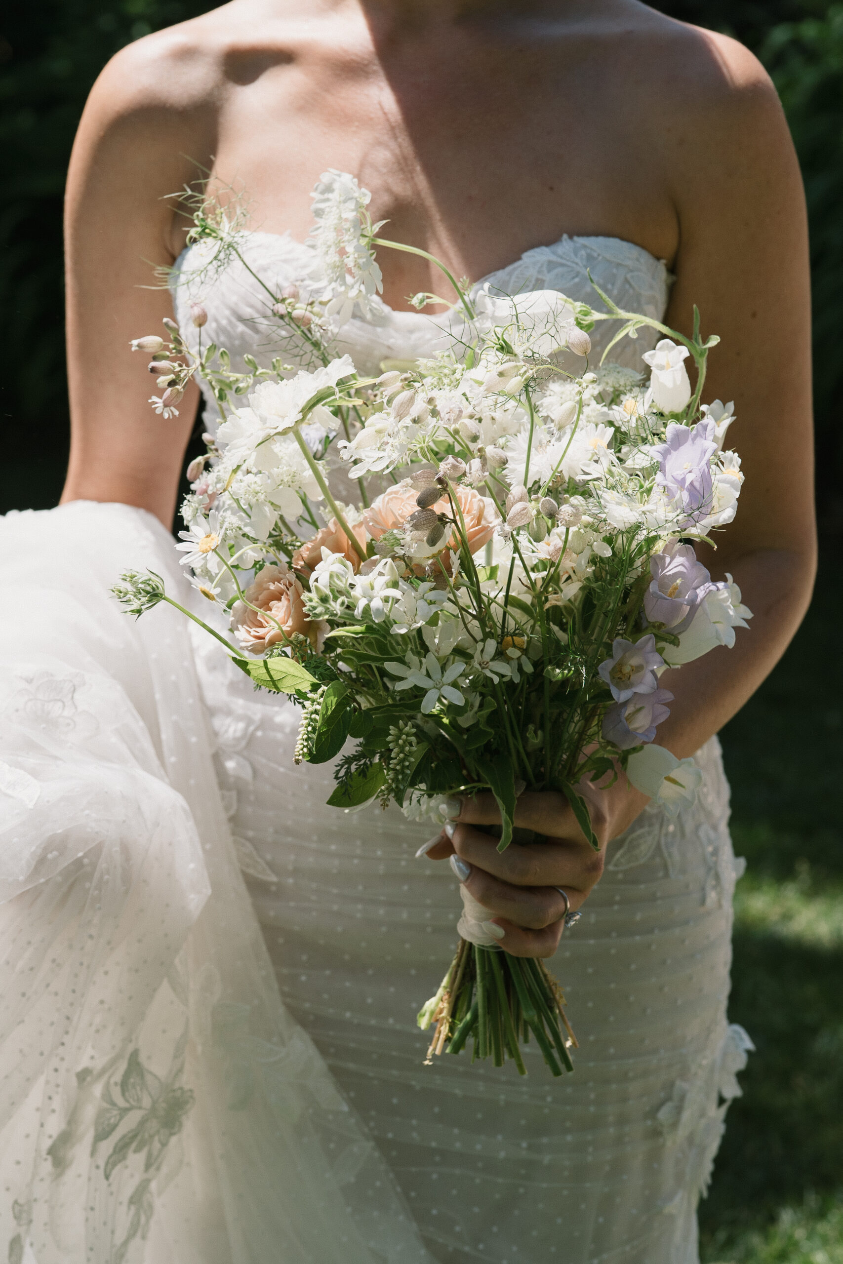 a high contrast photo of the bride and her bouquet at The Griffin House