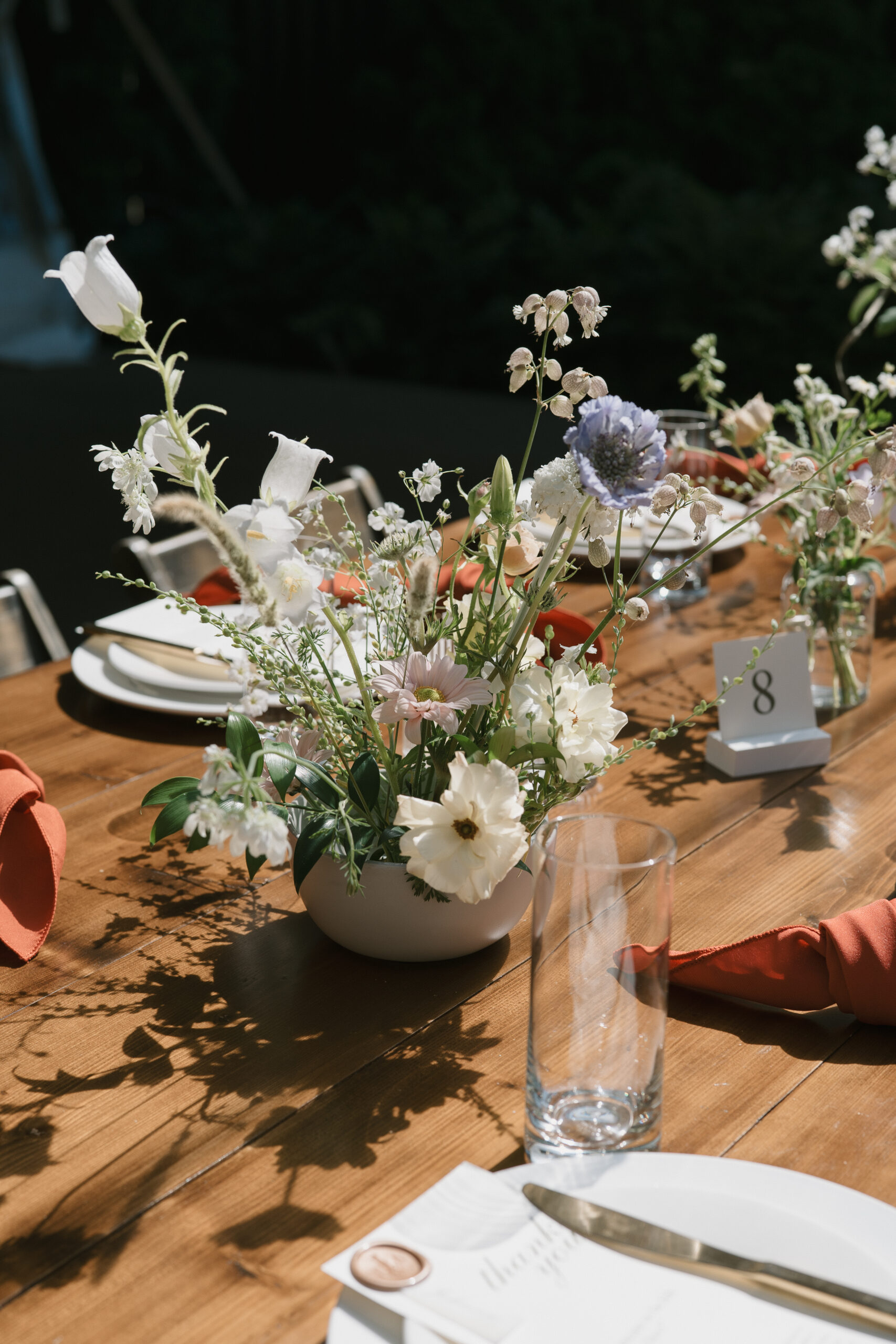 whimsical and stunning florals on the tables for the wedding reception