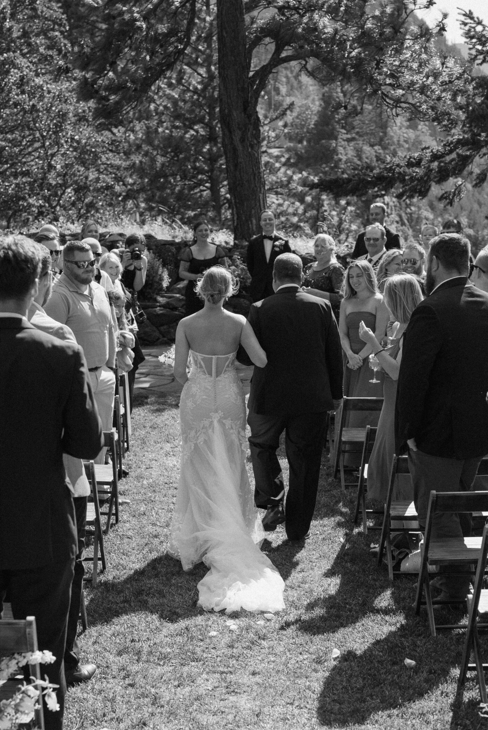 Bride walking down the isle to her groom at The Griffin House