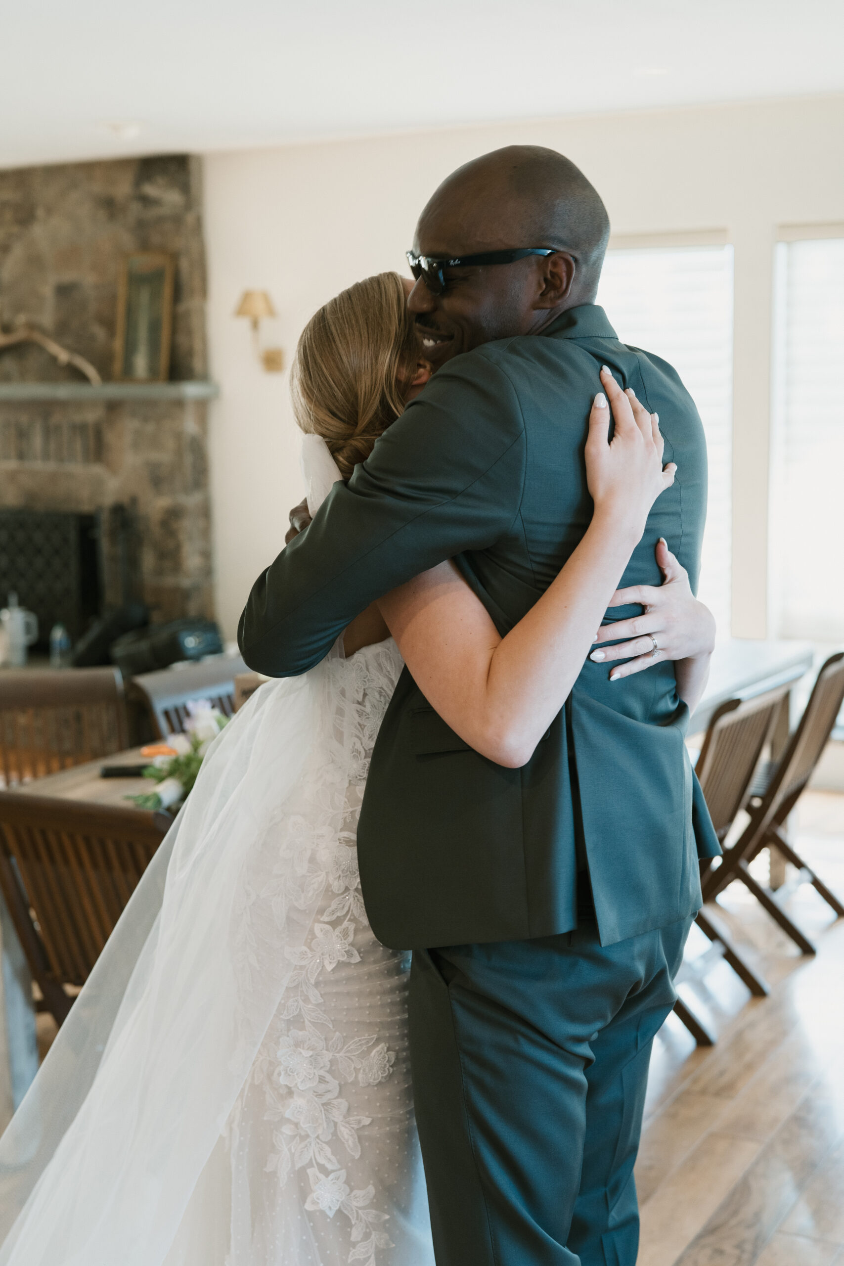 bride embracing a friend after the ceremony