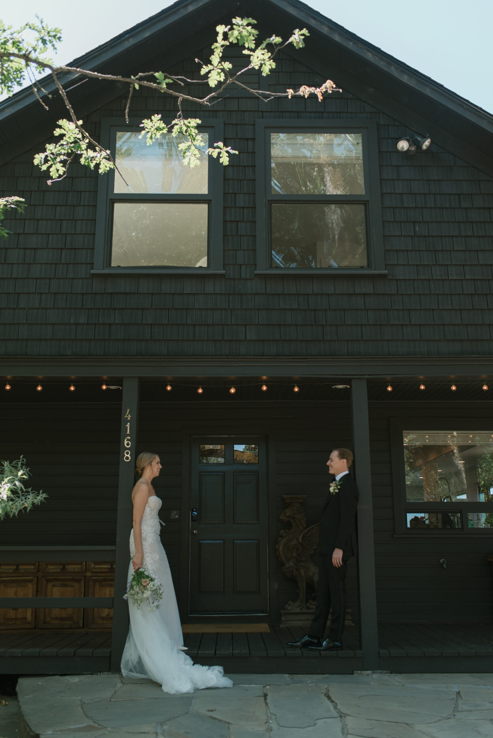 The Bride and groom on the front side of the Griffin House