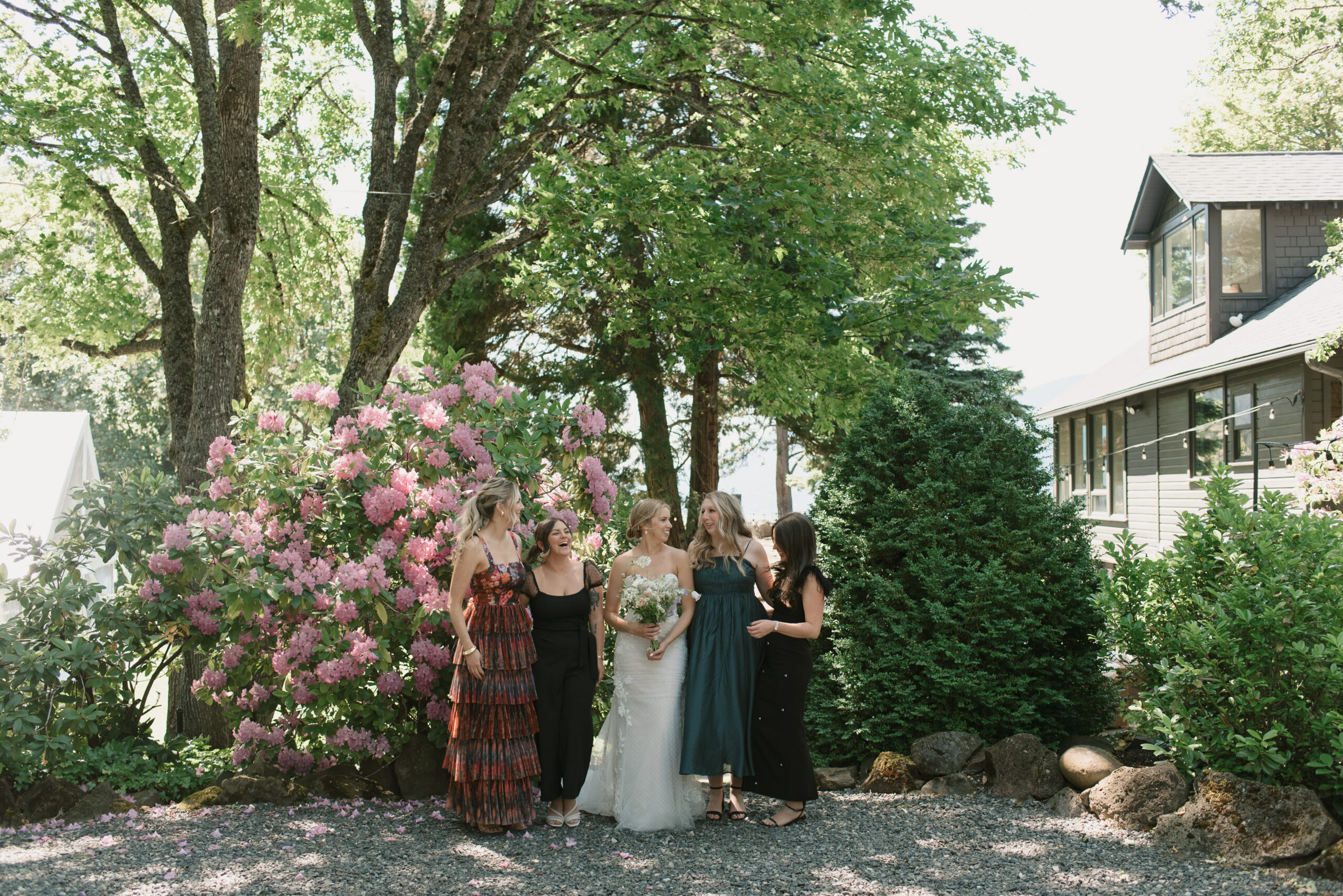 The bride and her closest friends laughing at each other