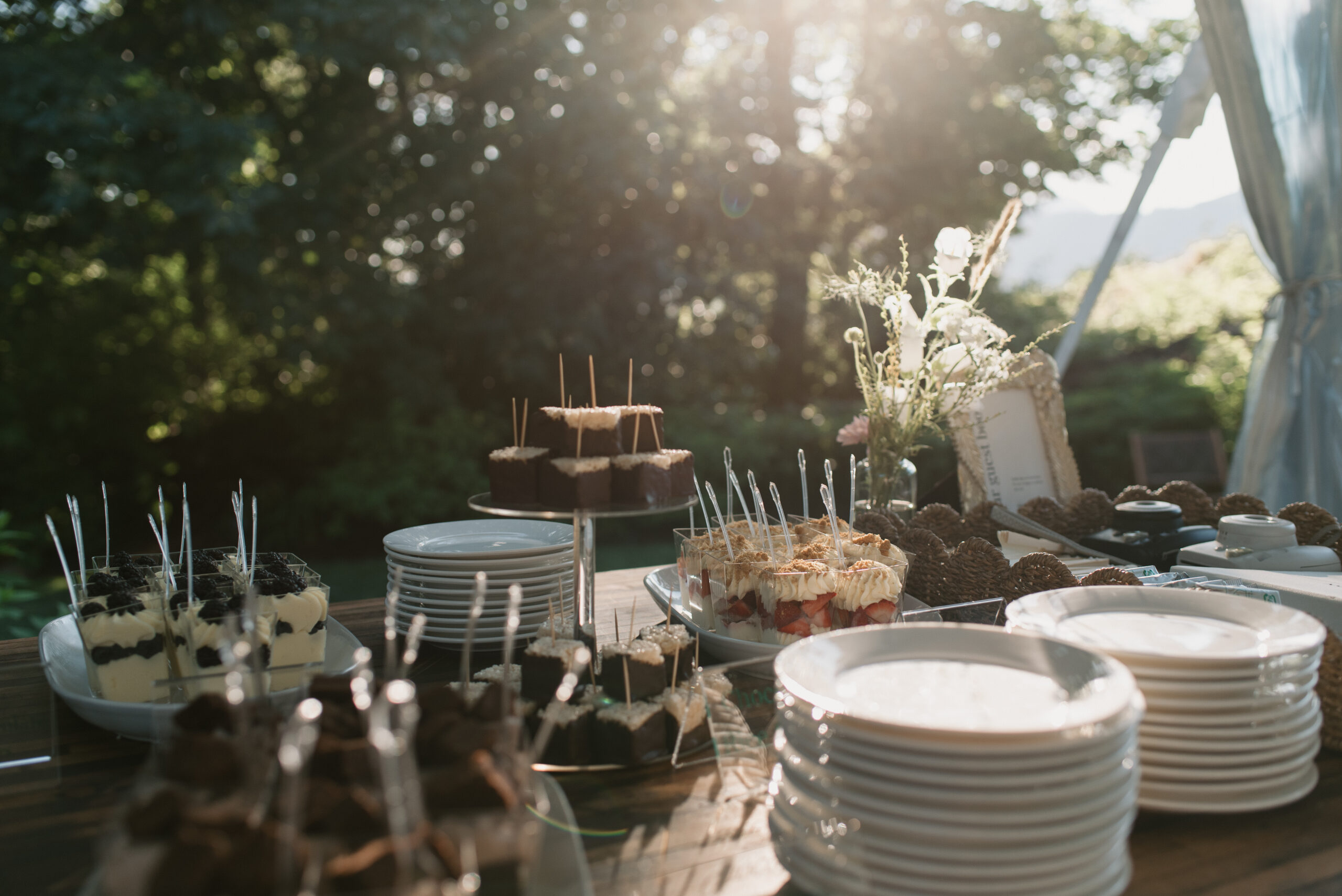 golden hour photo of the dessert table at the griffin house