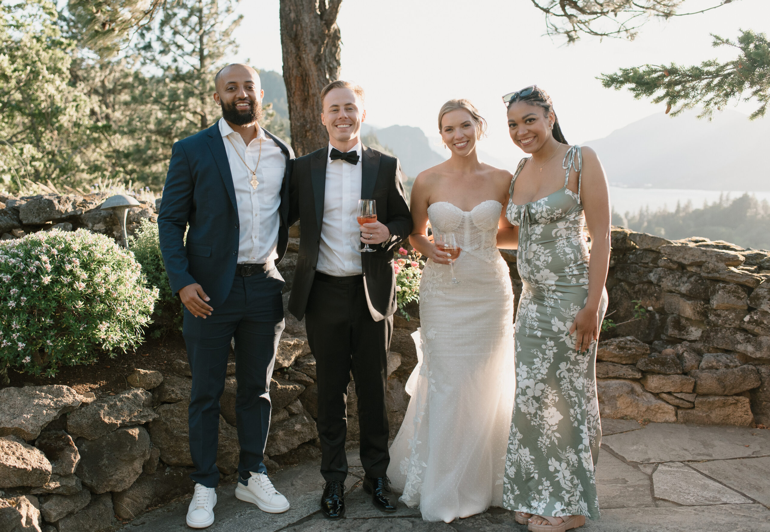 bride and groom with their guests who traveled the furthest