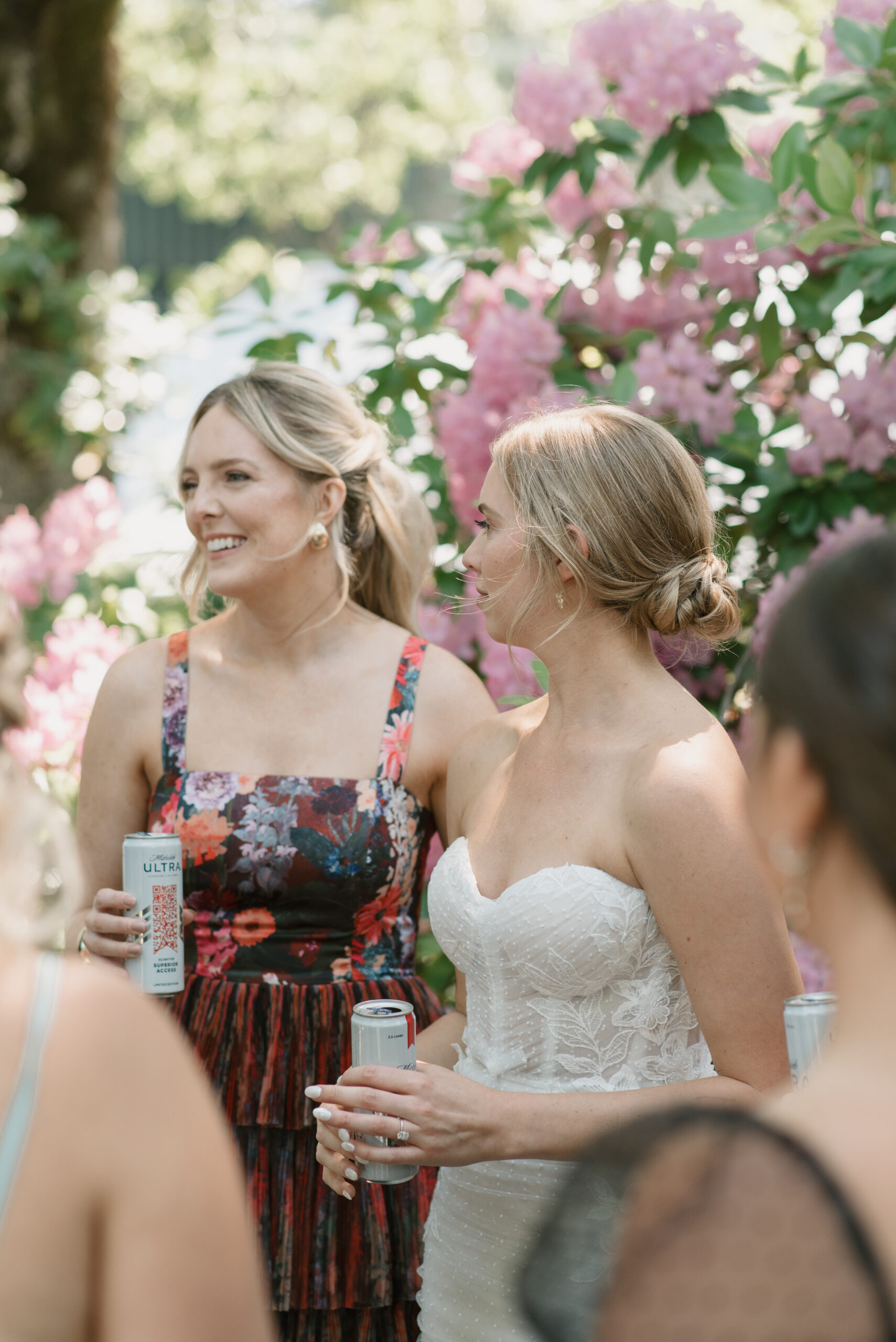 A candid shot of the bride interacting with her closest friends