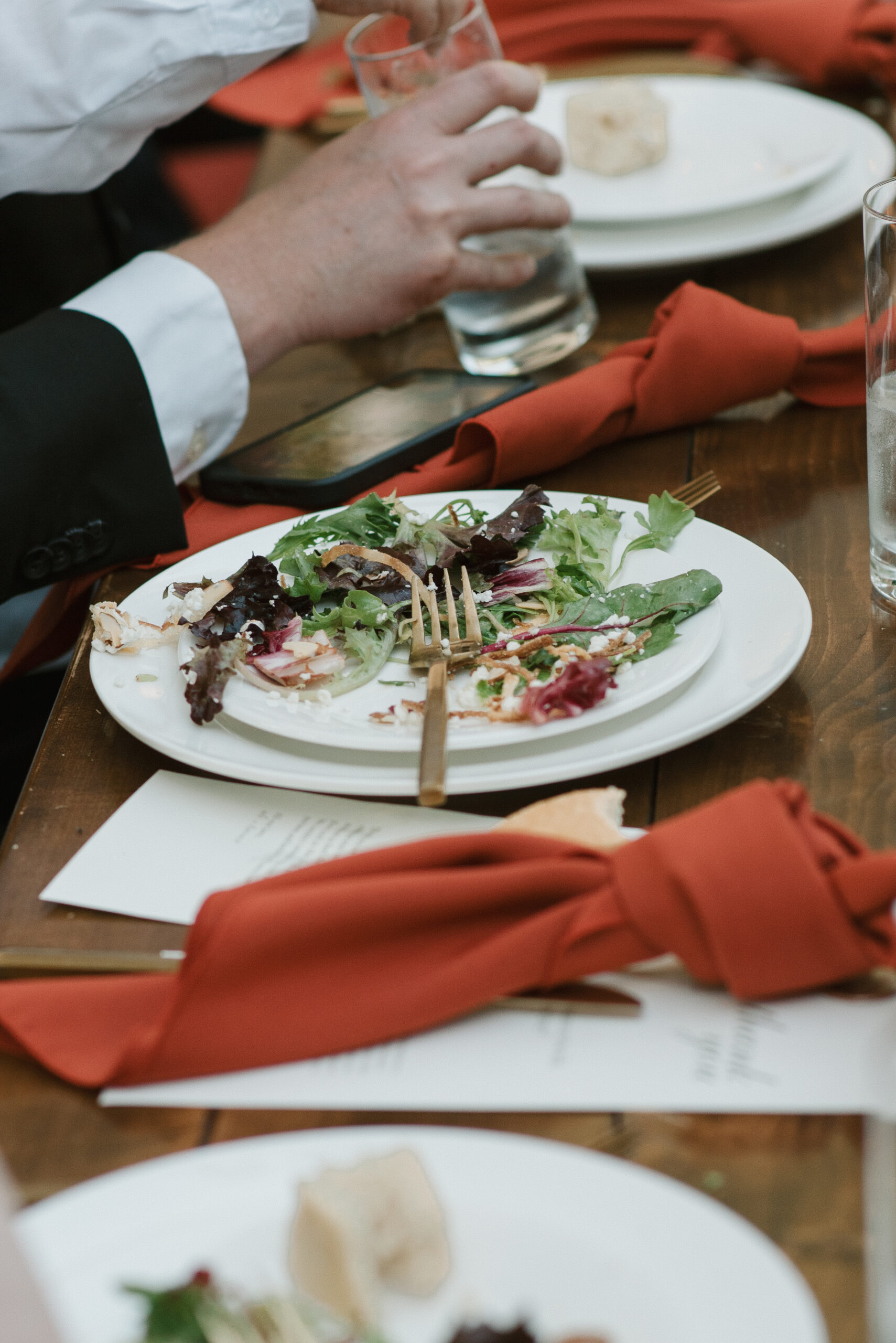 dinner plate after a guests has had a gourmet salad