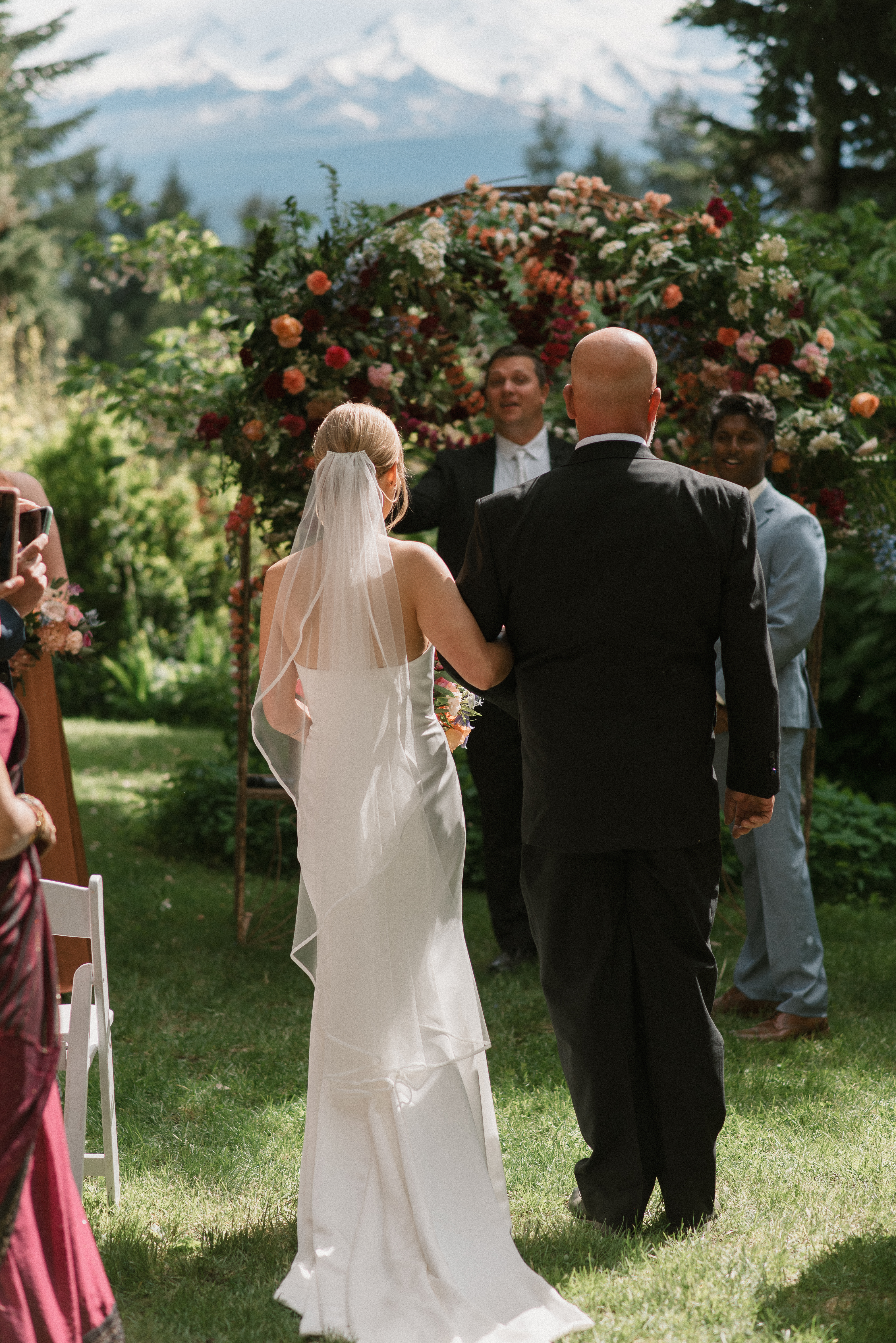 father of the bride handing off the bride to the groom