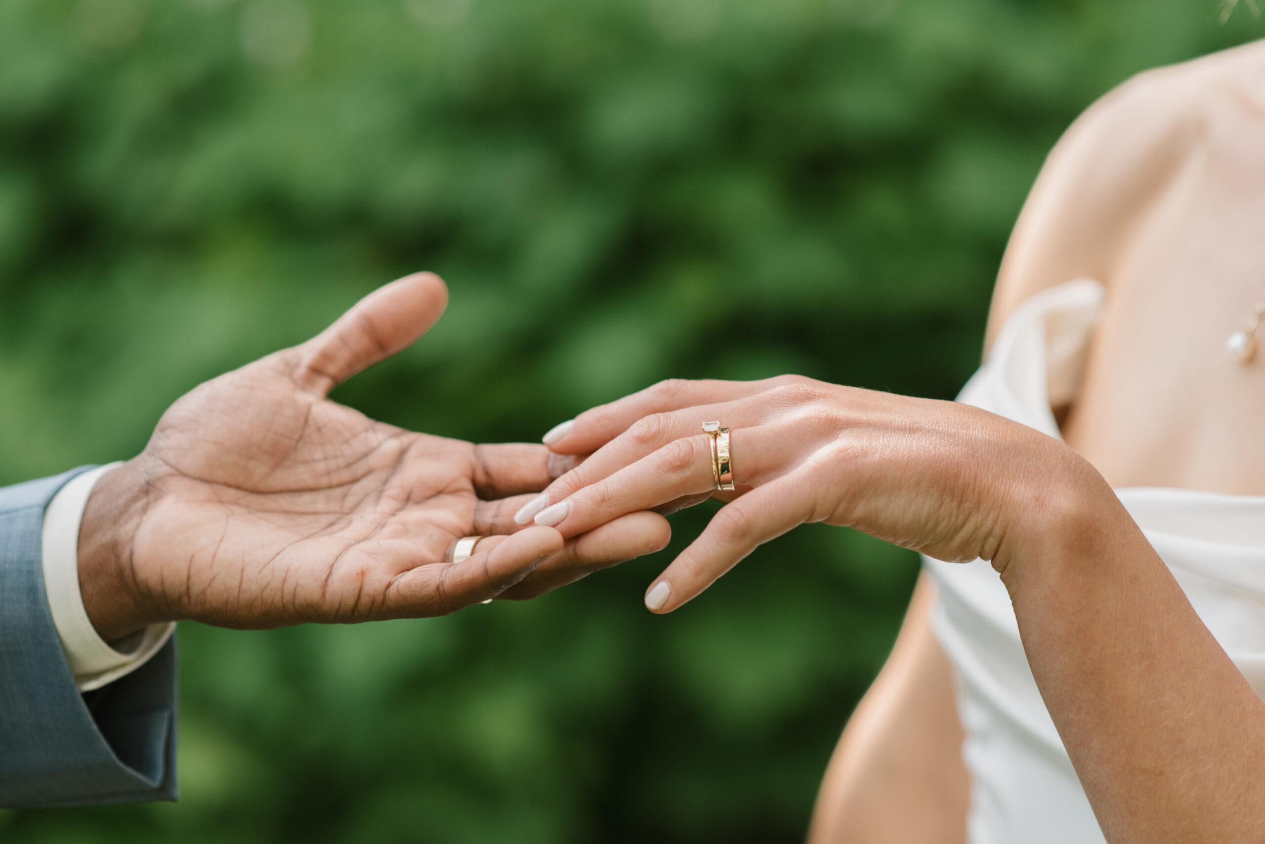 bride and groom holding hands