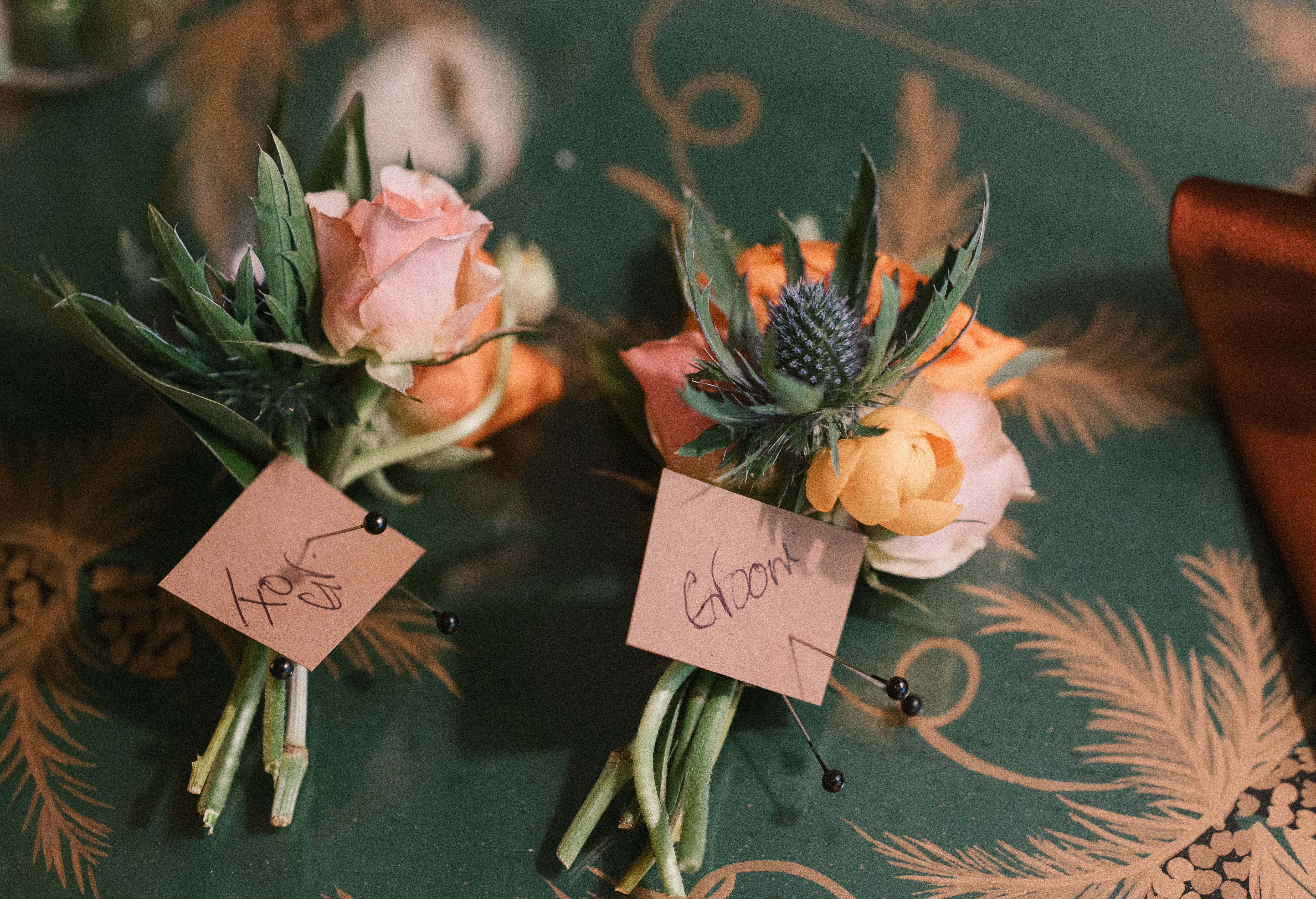 close up detail shot of the boutonnieres for the groom