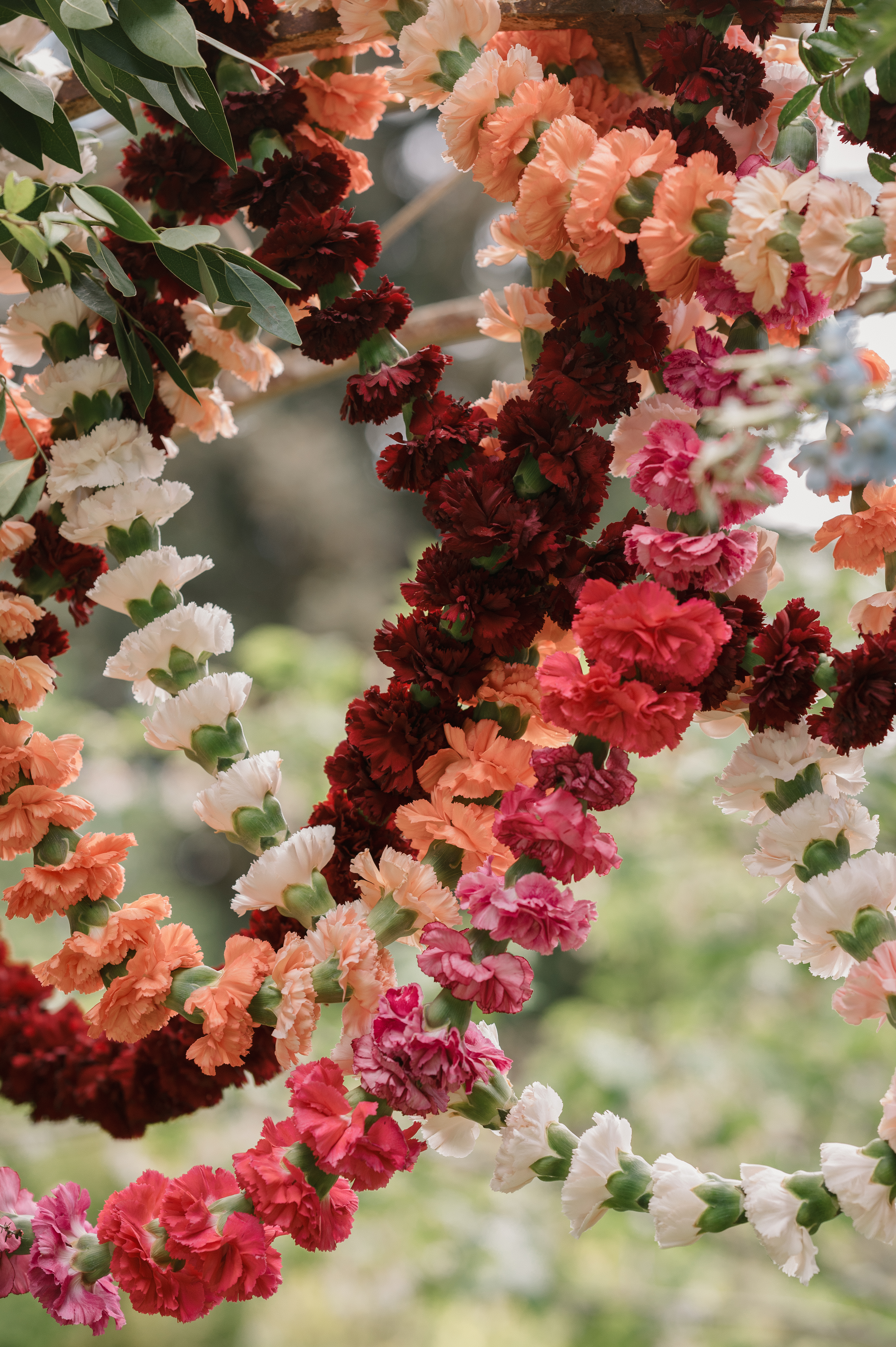 traditional indian carnation garland for a mt hood organic farms wedding