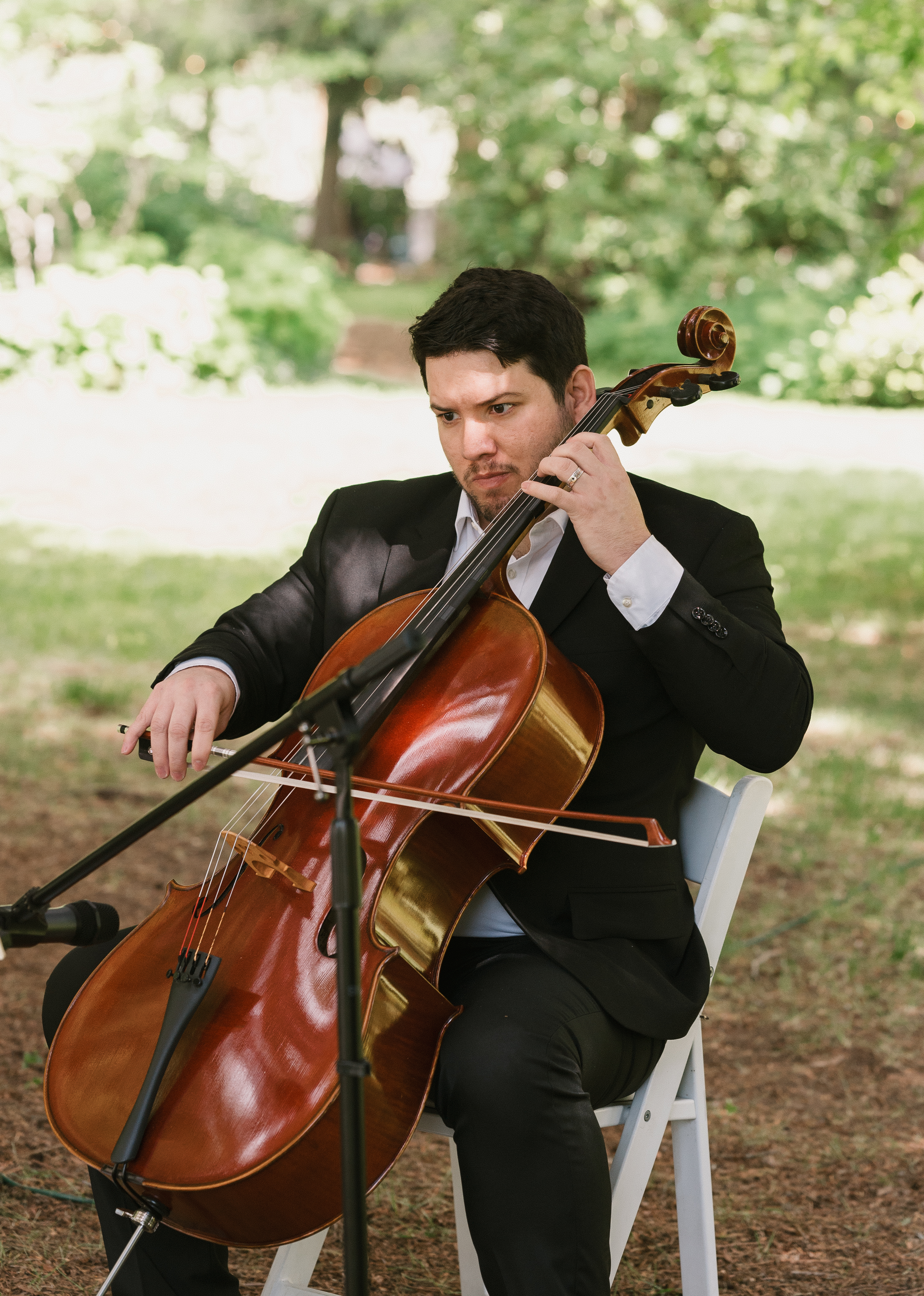 live cello player playing live music for the ceremony at mt hood organic farms wedding