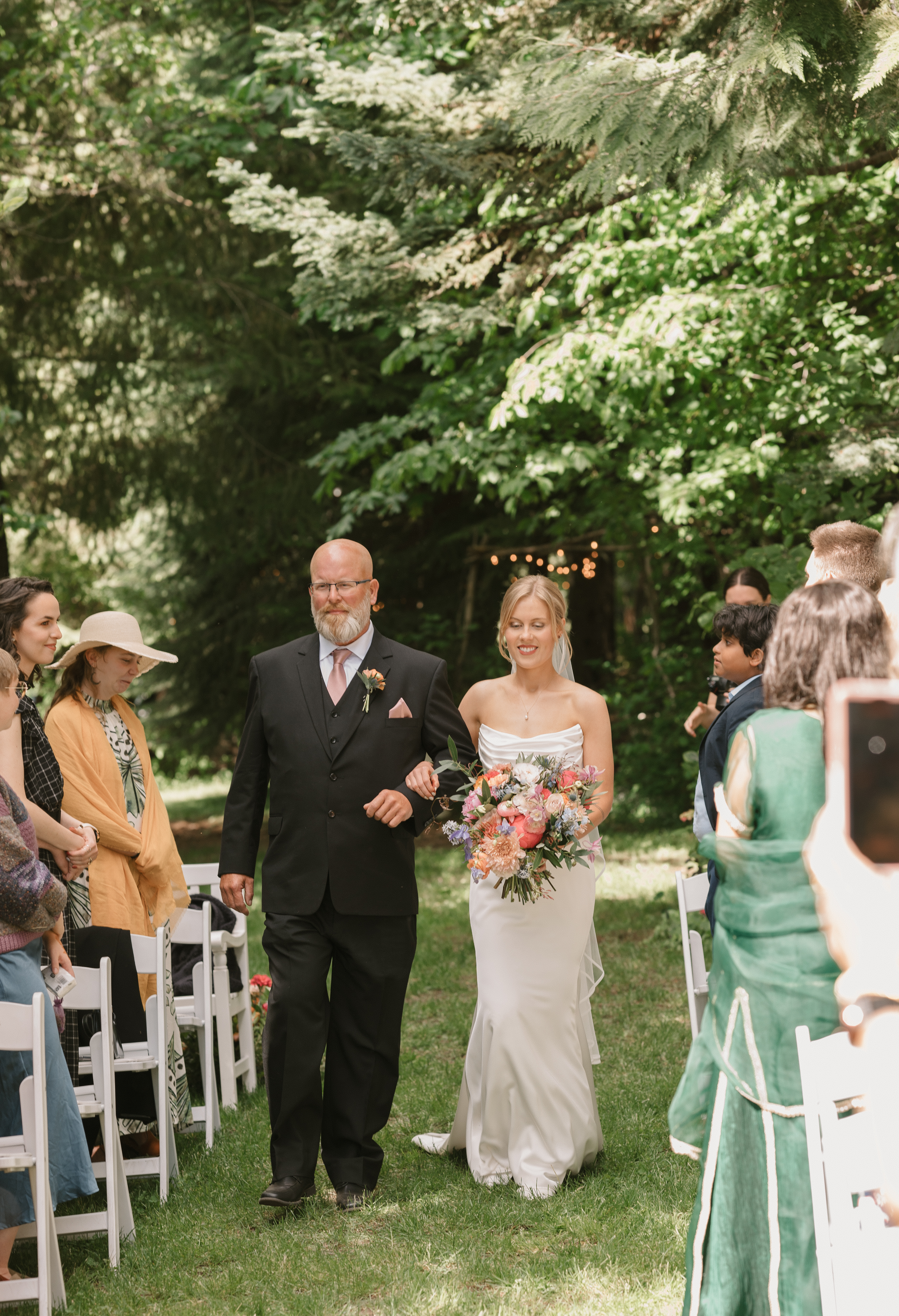 bride walking down the isle with her father