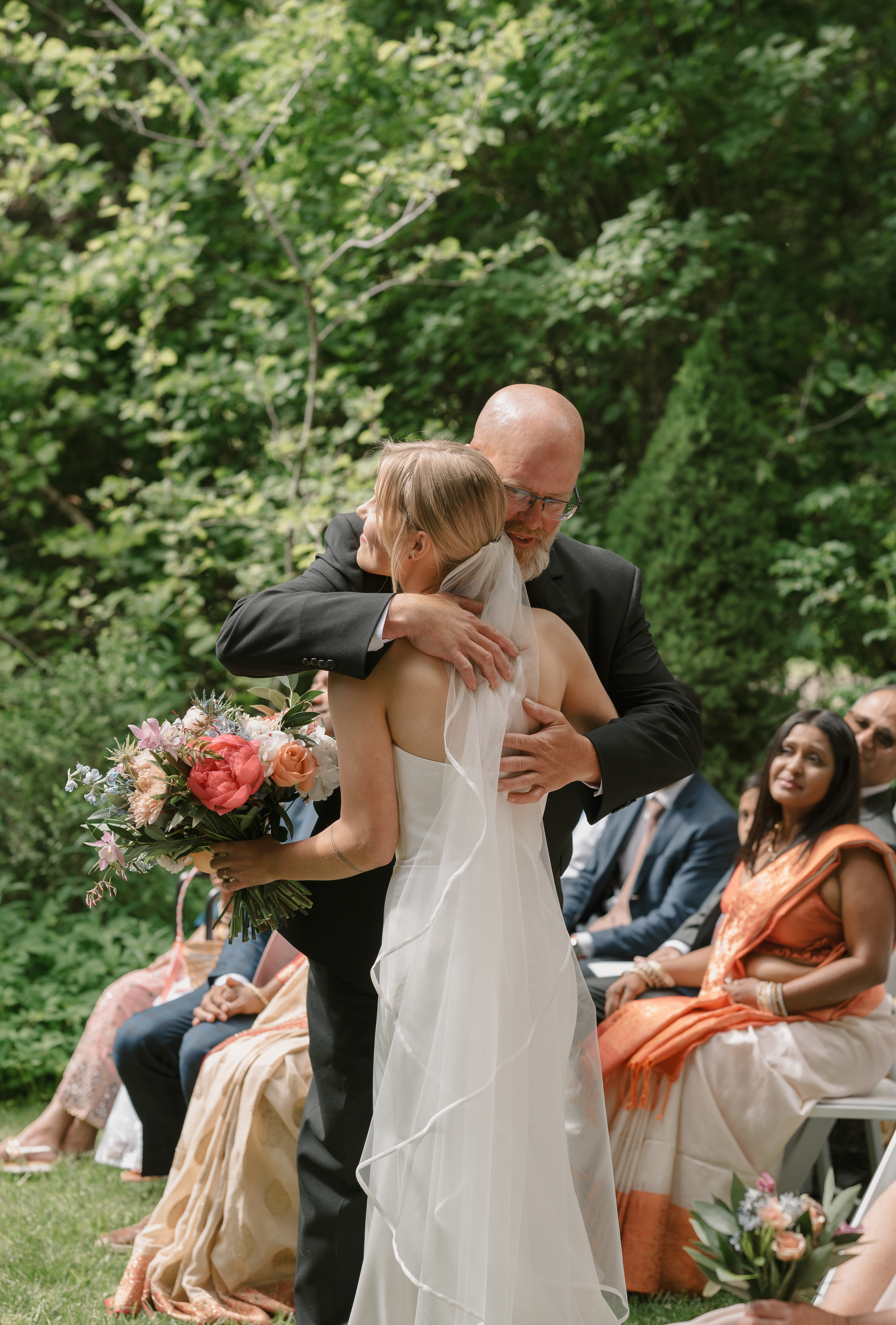 bride hugging her father at mt hood organic farms wedding