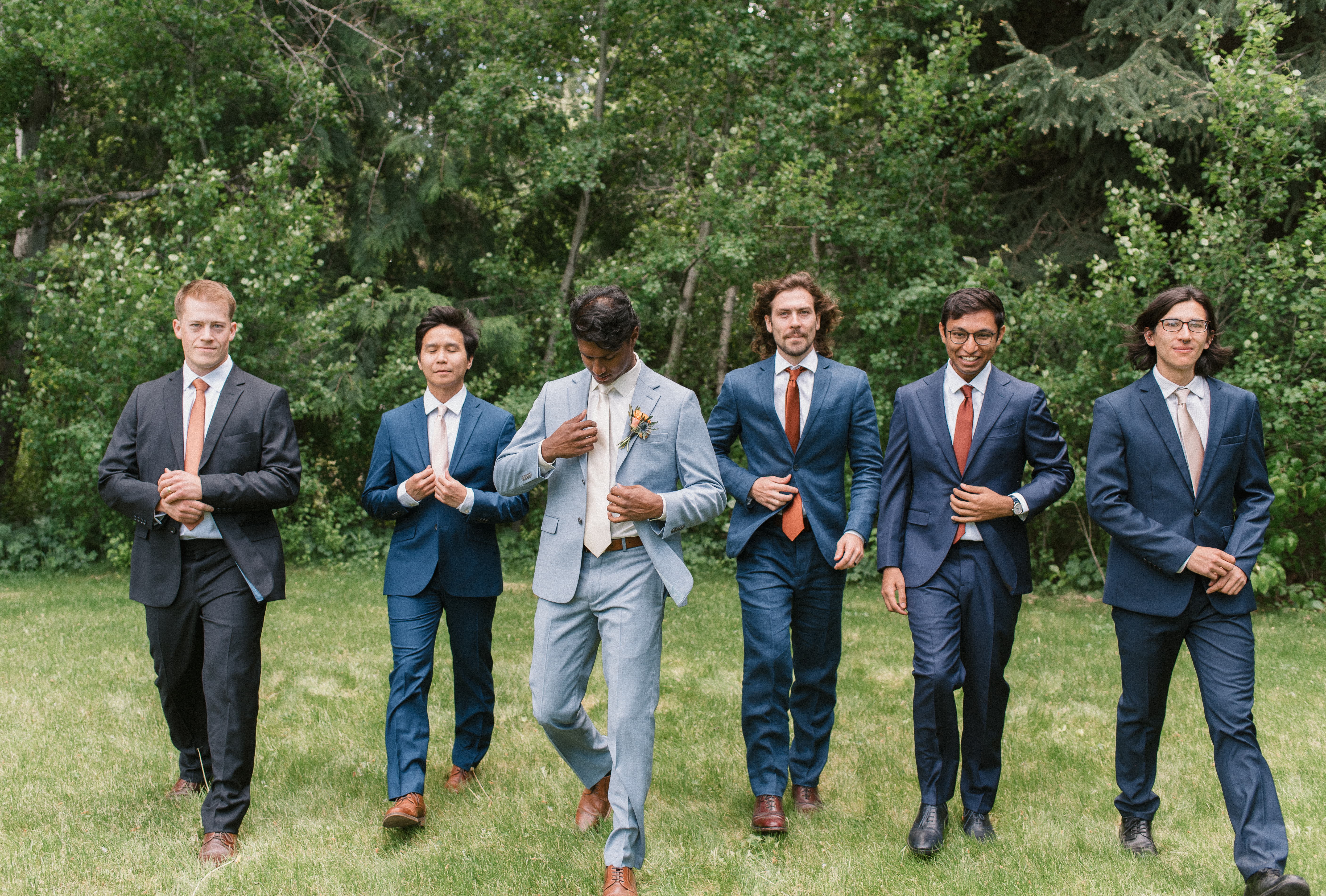 candid photo of groom with his groomsmen