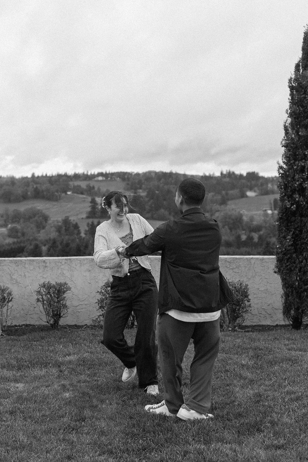 black and white of couple being playful