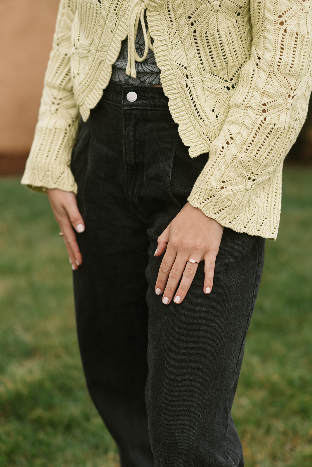 outfit shot of new engagement ring