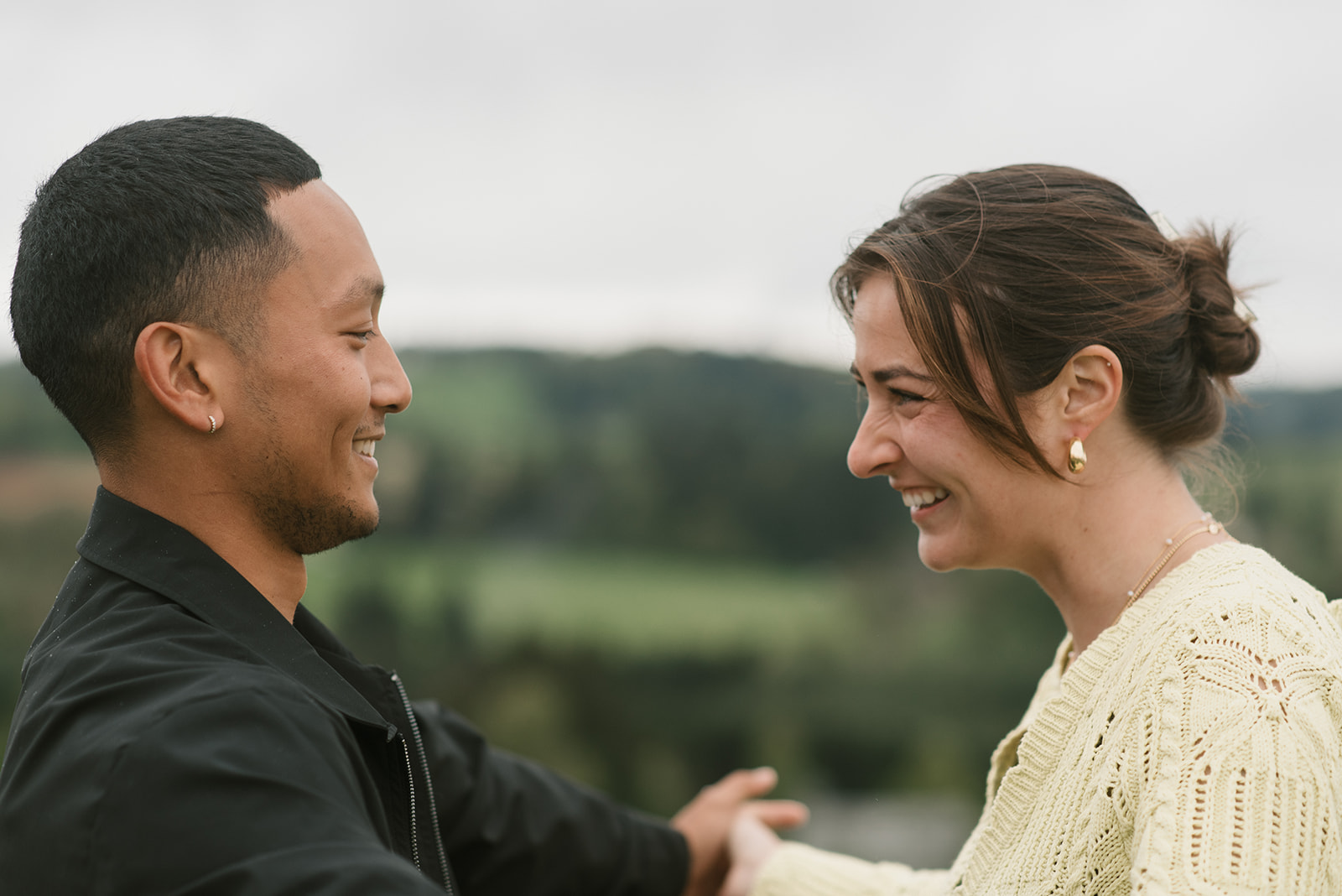 couple laughing after engagement