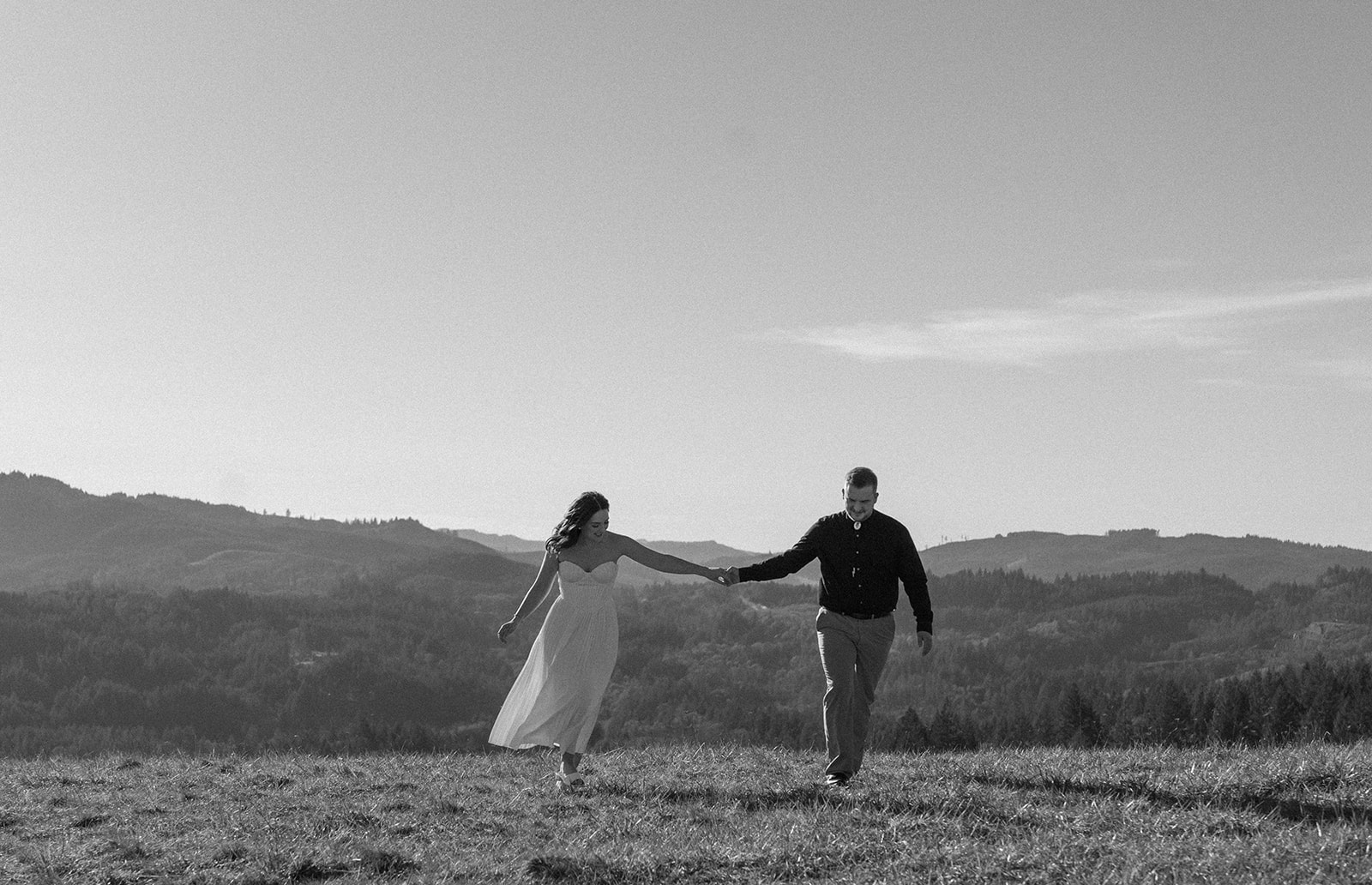 black and white hillside couple photo