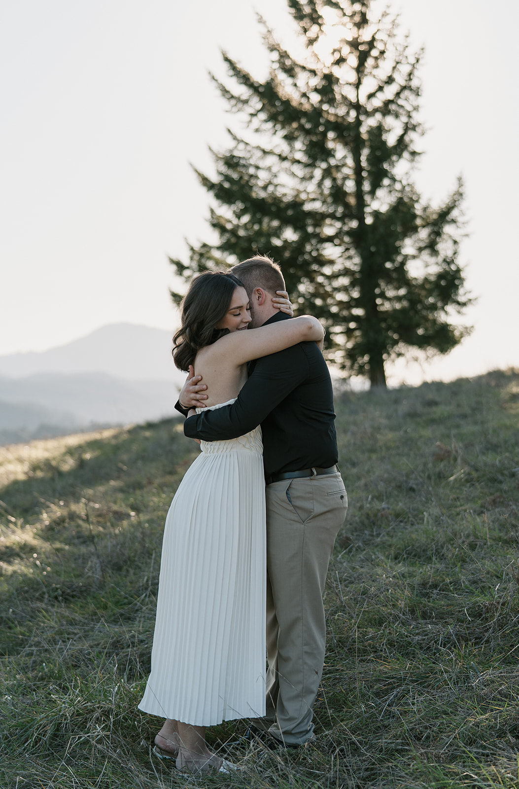 couple embraced during their engagement photos