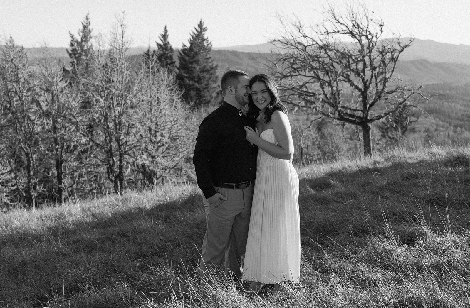 black and white photo of couple at engagement sesion