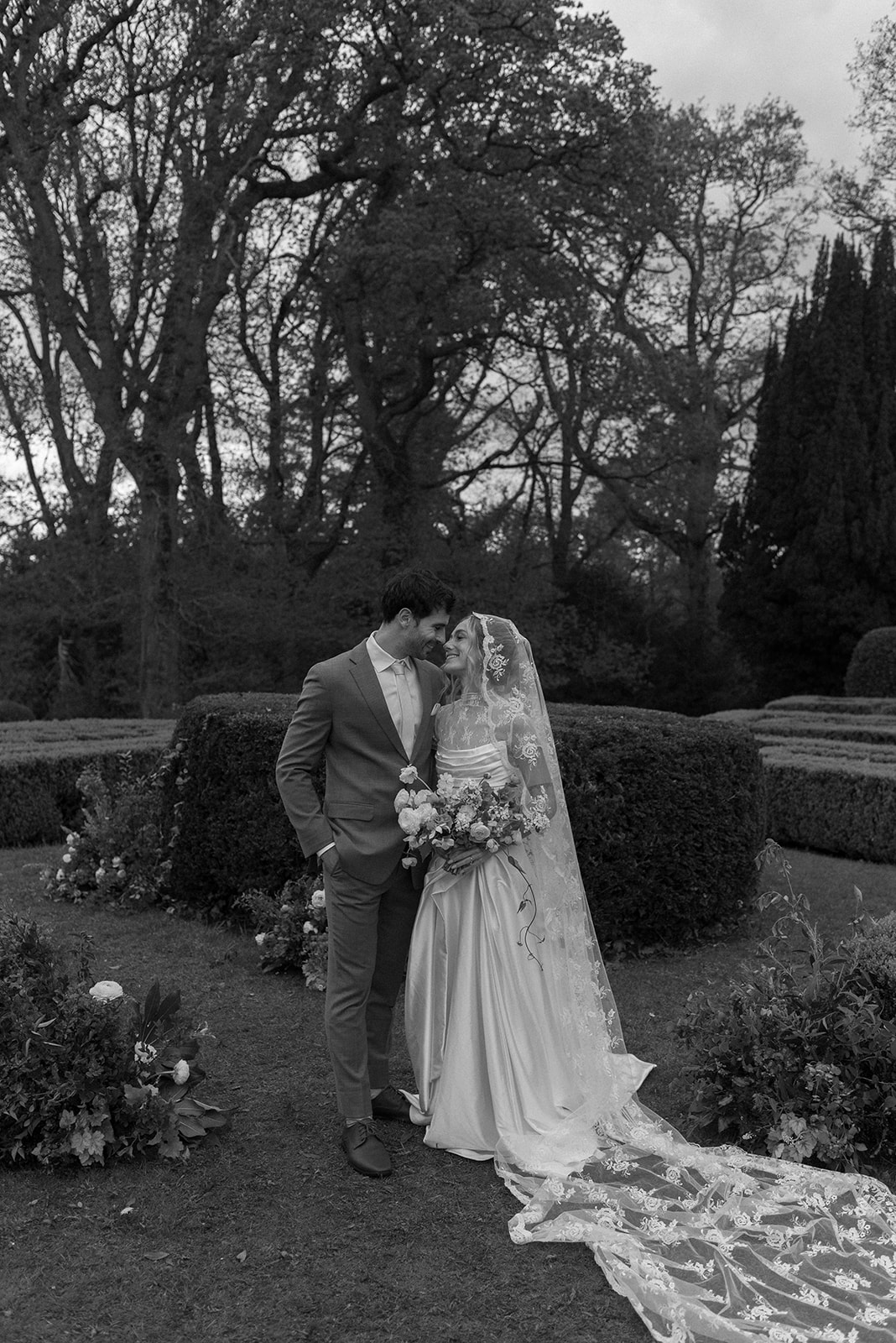 Black and white photo of couple sharing a quiet moment after ceremony, emotional Ireland intimate wedding