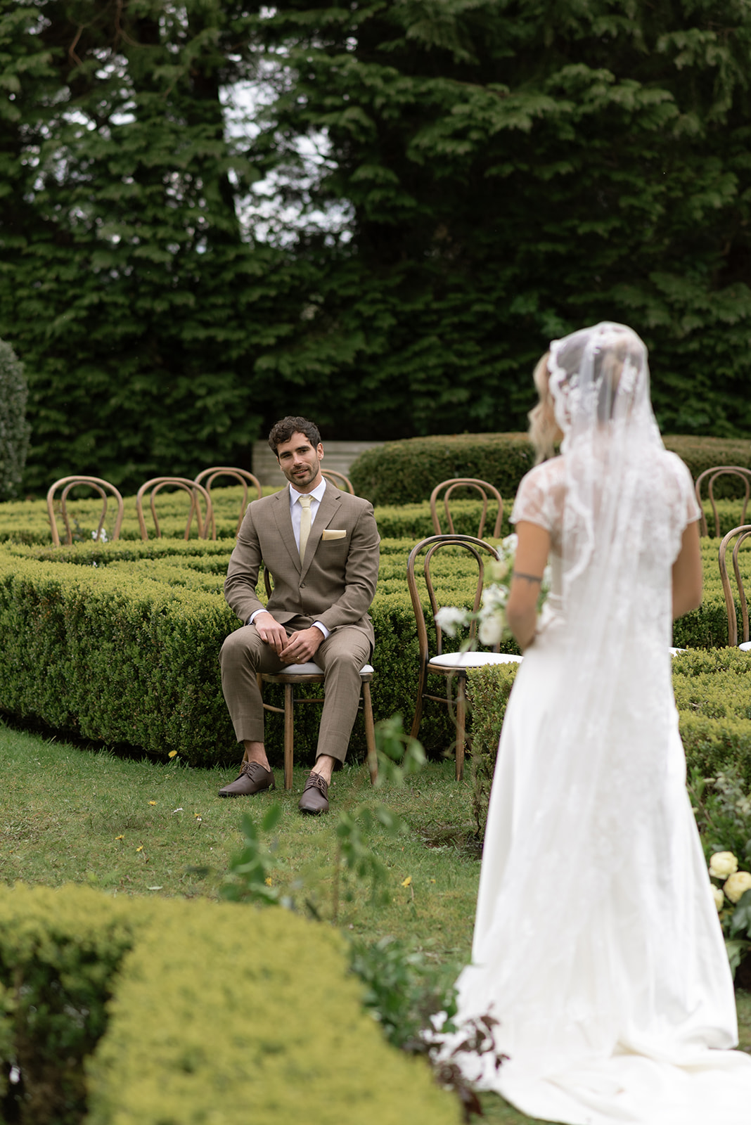 groom admiring his bride on their wedding day at hilton park manor in ireland