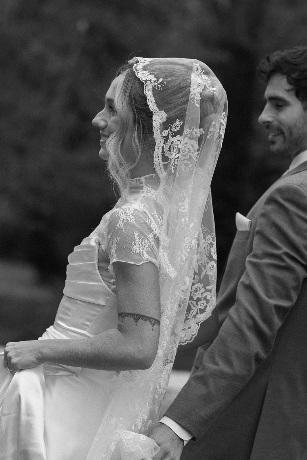black and white candid photo of couple on their wedding day in ireland