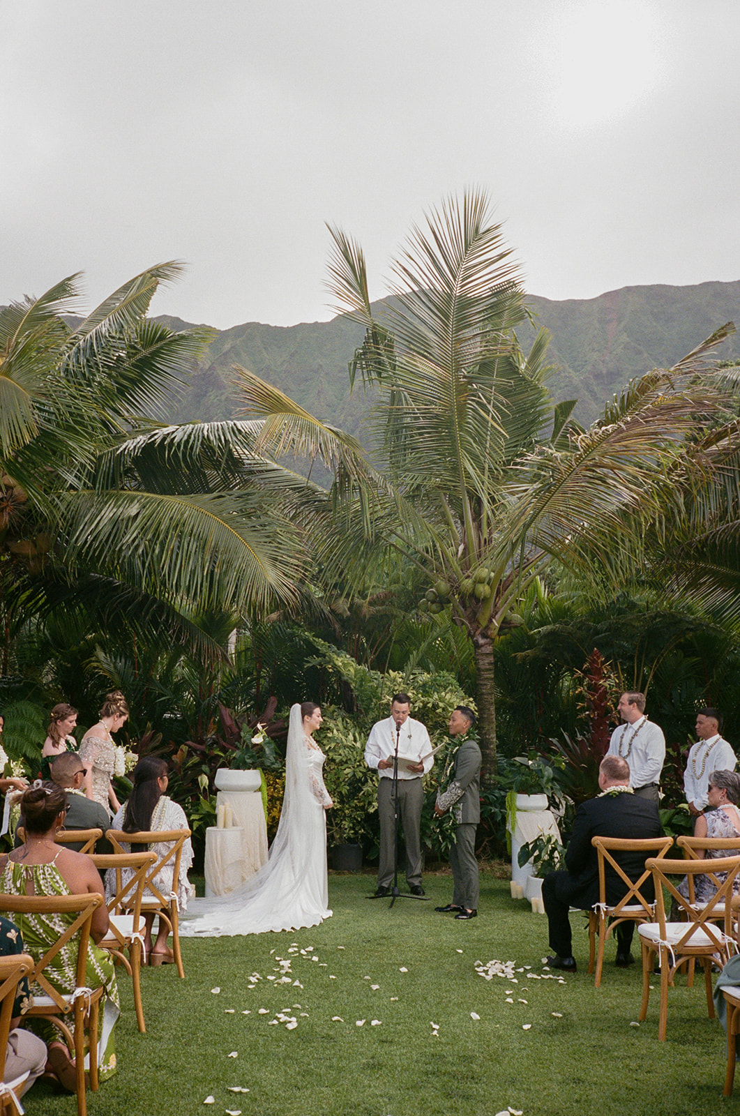 film photo of bride and groom standing at the alter at their hawaiian wedding taken by a destination oahu wedding photographer